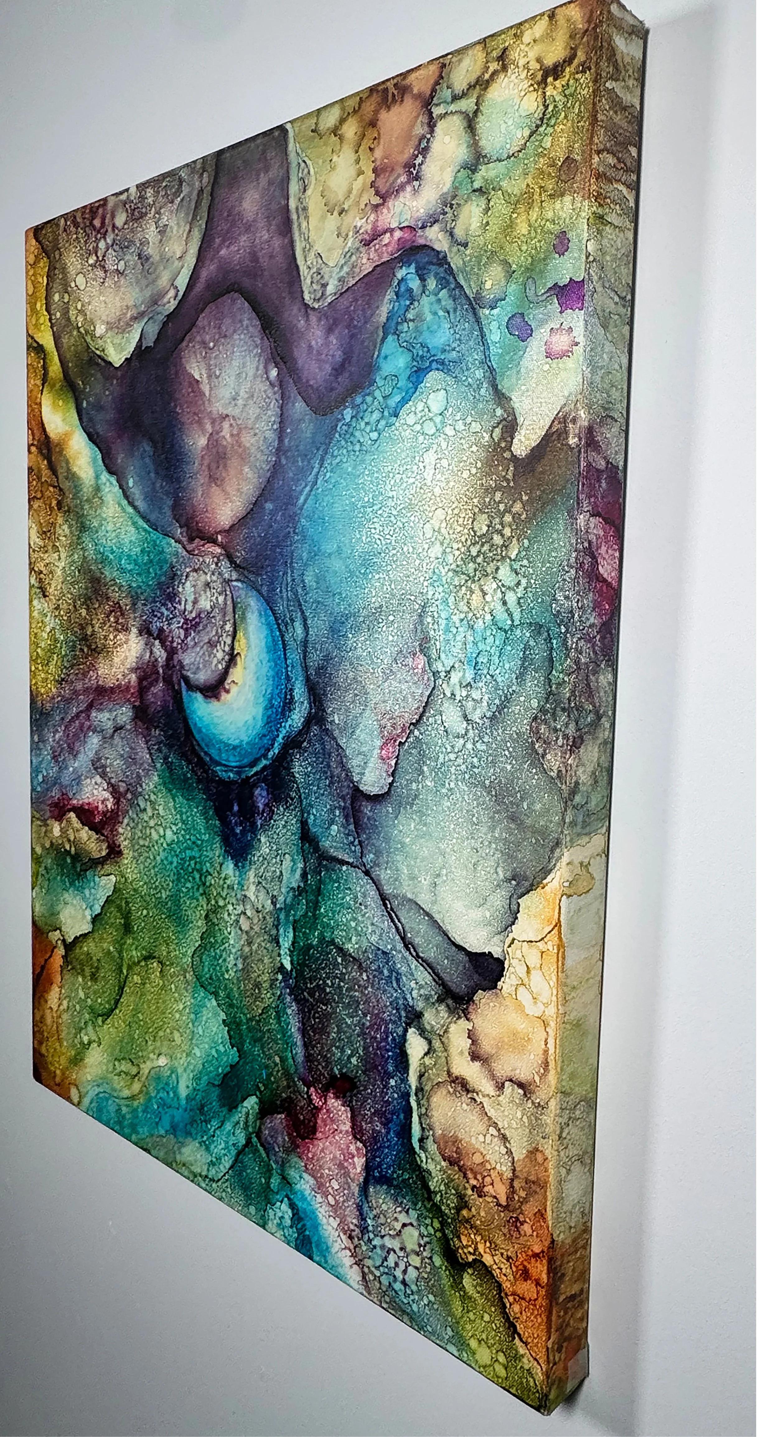 Large colorful abstract gallery wrapped canvas wall art with ethereal teal, turquoise, purple, and gold textures for modern contemporary home decor.
