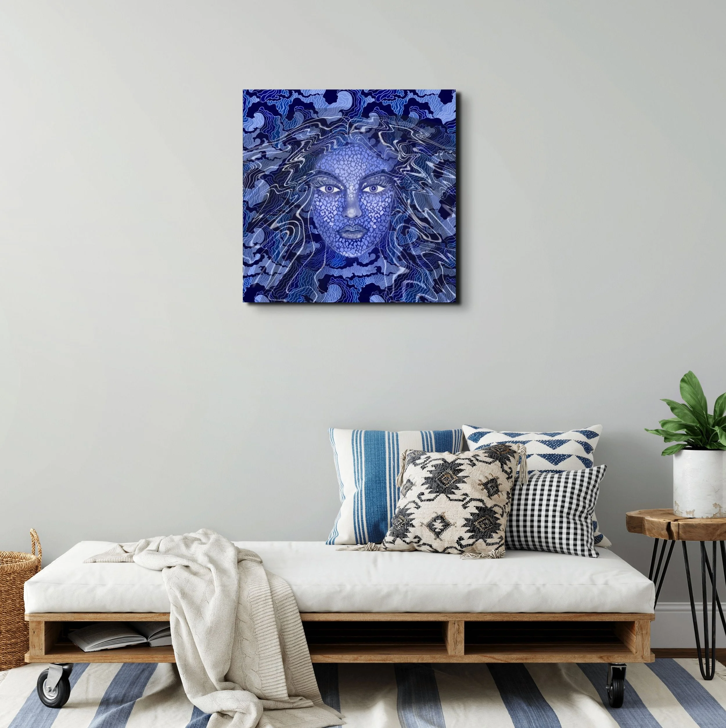 Celestial blue goddess portrait wall art with ocean-inspired abstract textures displayed in a modern contemporary interior space.