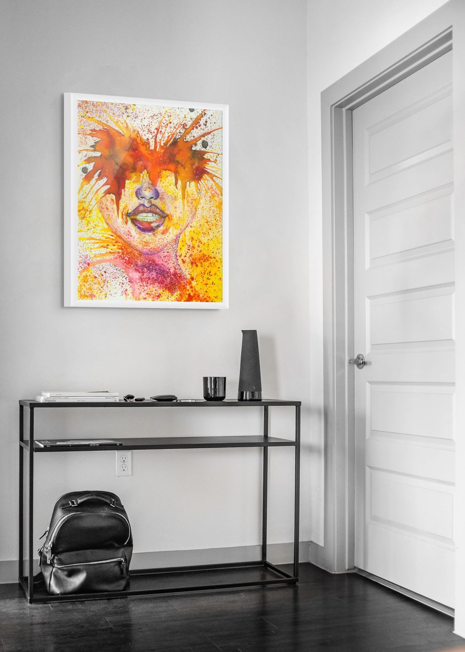 Expressive, colorful portrait of a woman with fiery abstract textures displayed in a contemporary interior space.