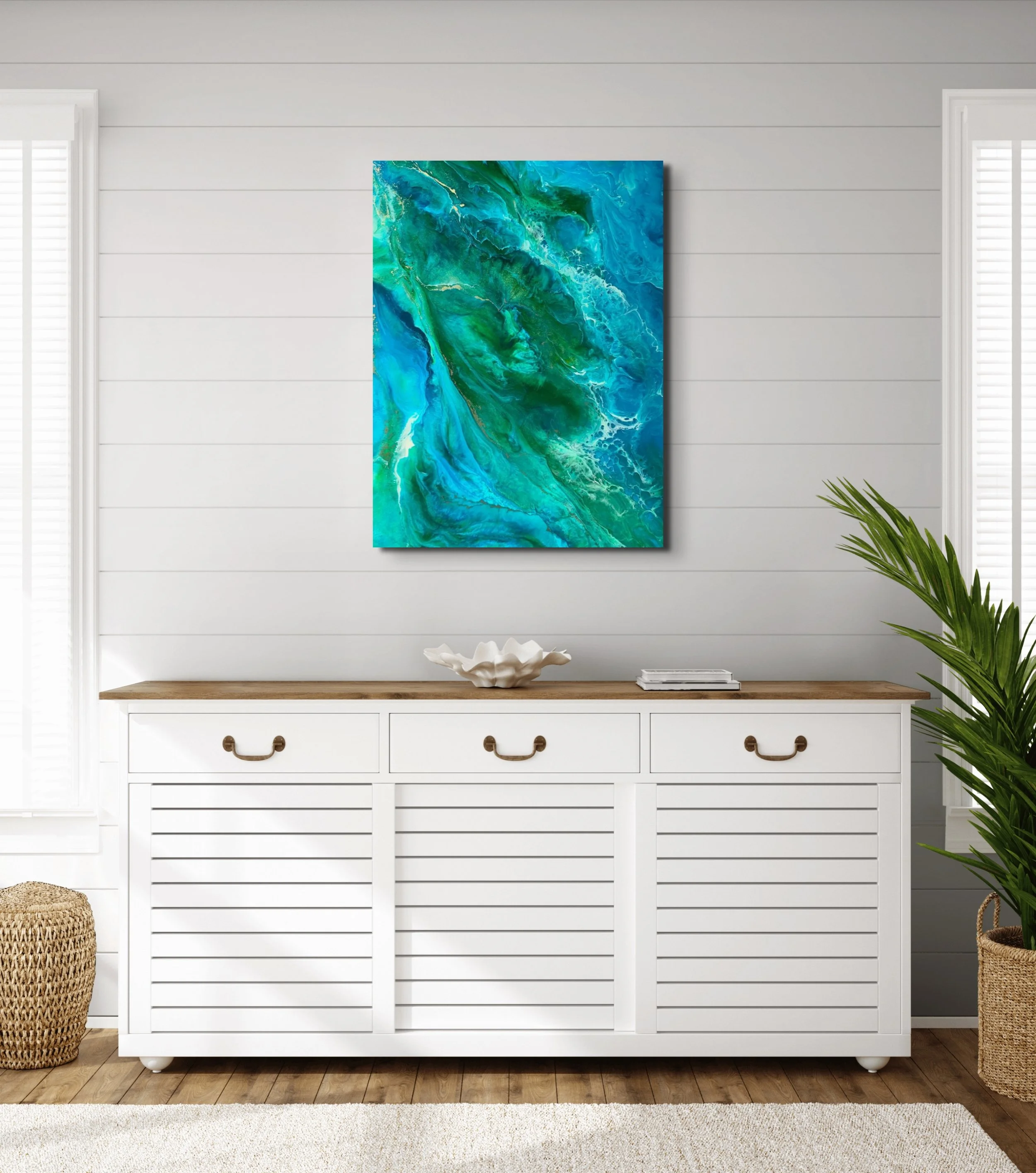 Blue and green coastal abstract wall art with flowing wave-inspired textures displayed in a modern contemporary interior space.