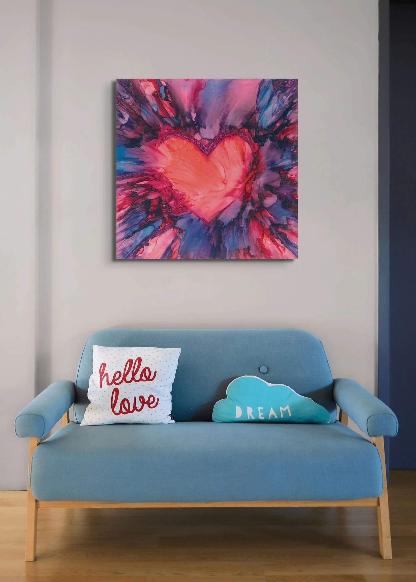 Pink and red heart abstract wall art displayed in a modern living room with bold expressive textures and vibrant contemporary decor.