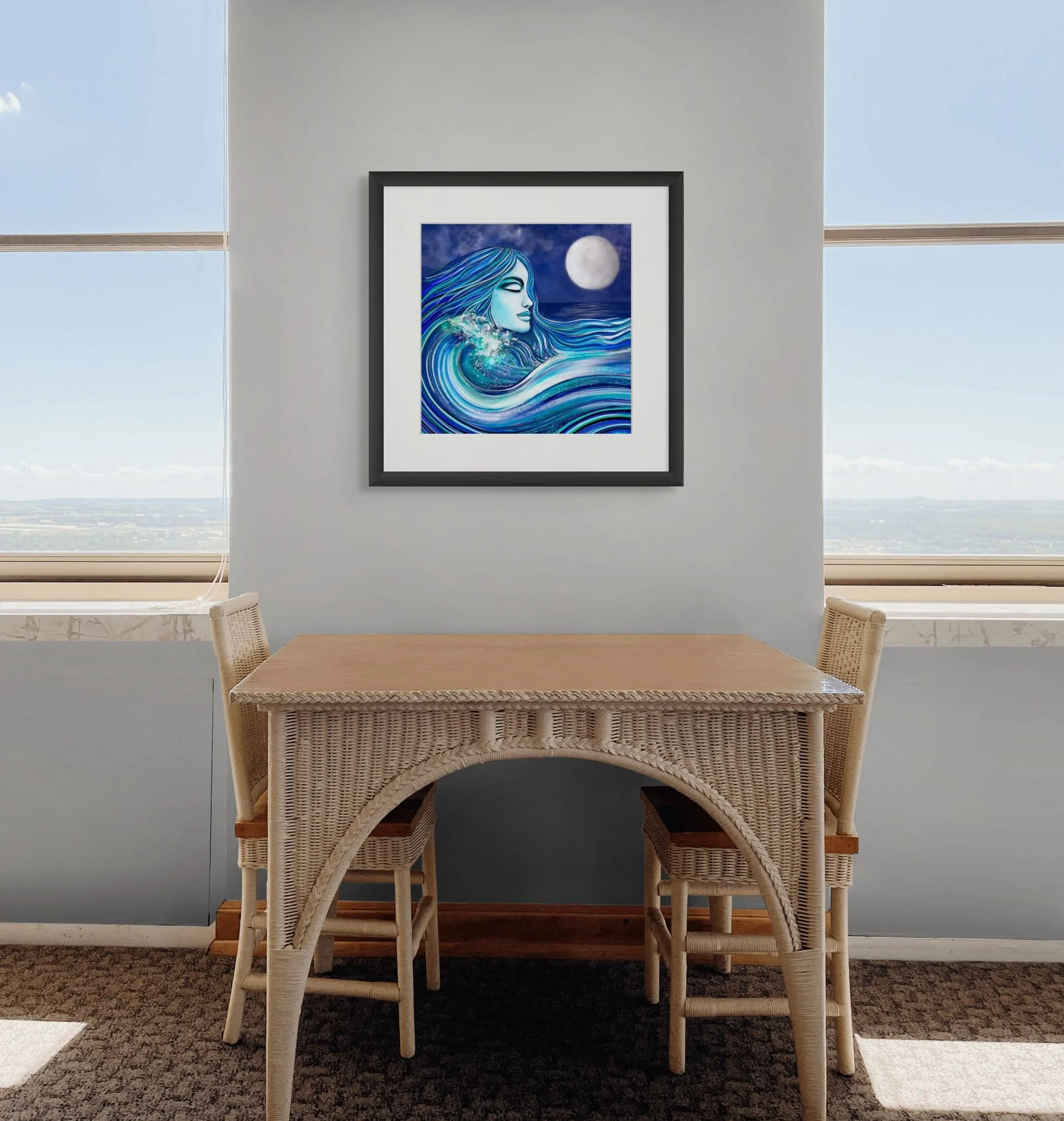 Blue mermaid coastal wall art with flowing ocean wave textures displayed in a modern beach-inspired interior space.