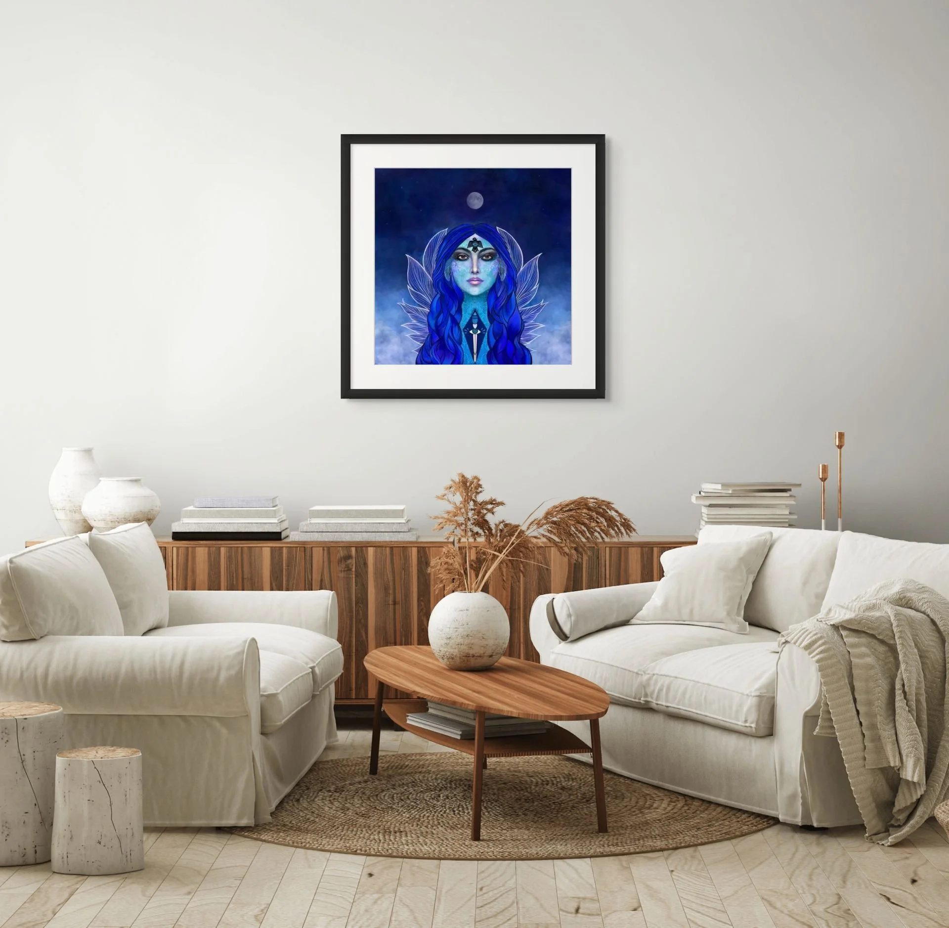 Deep blue goddess portrait wall art displayed in a modern living room with celestial feminine energy and mystical abstract decor.