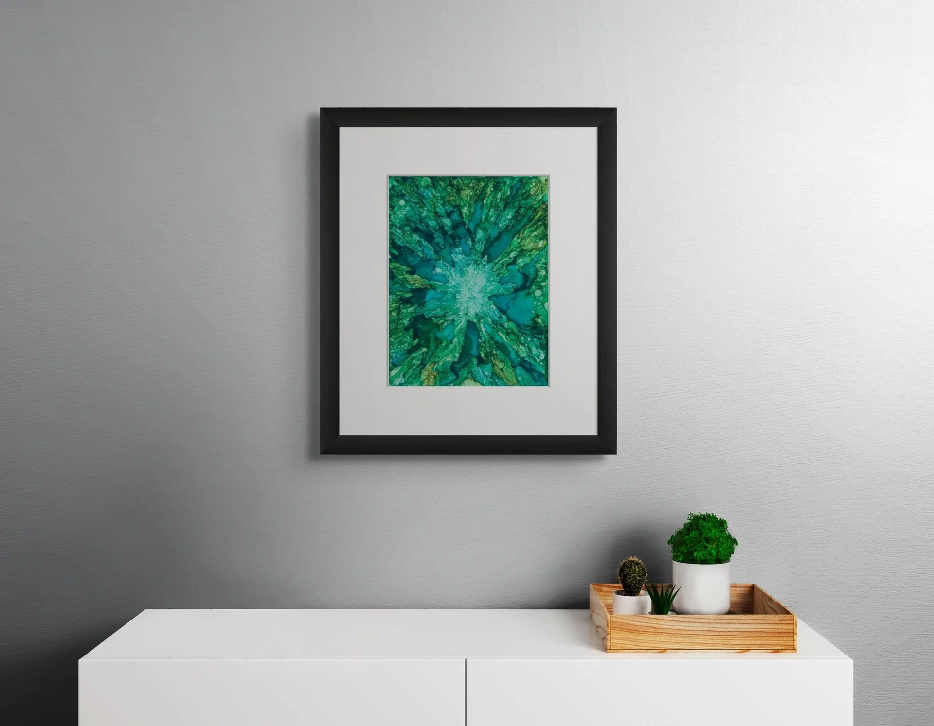 The Pull Inward fine art print framed in black with white mat abstract emerald teal alcohol ink wall art by Nadeane Friend