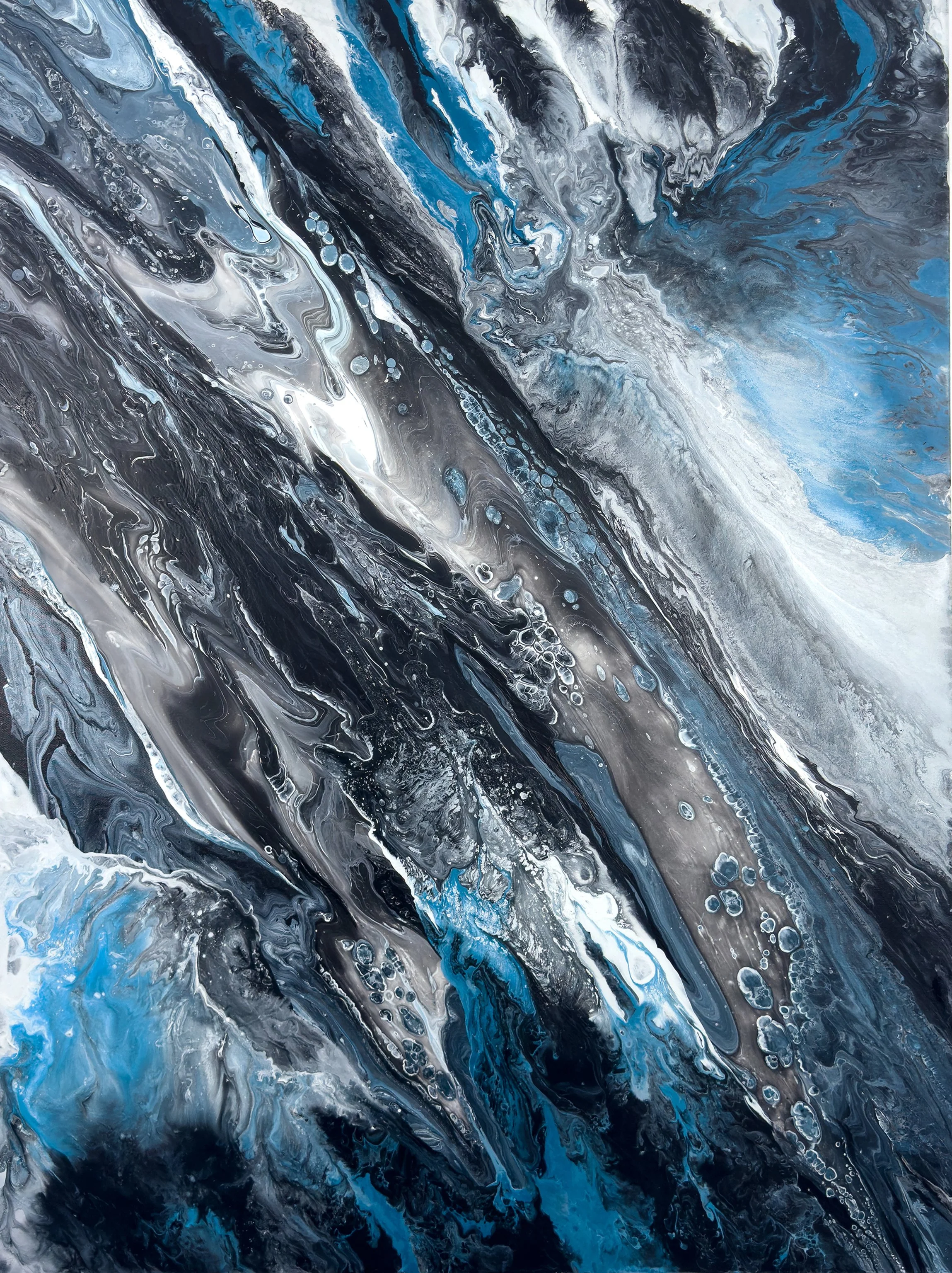 Large black, white, silver, and blue abstract acrylic painting with flowing marbled textures and storm-inspired movement, modern statement wall art for luxury home decor.