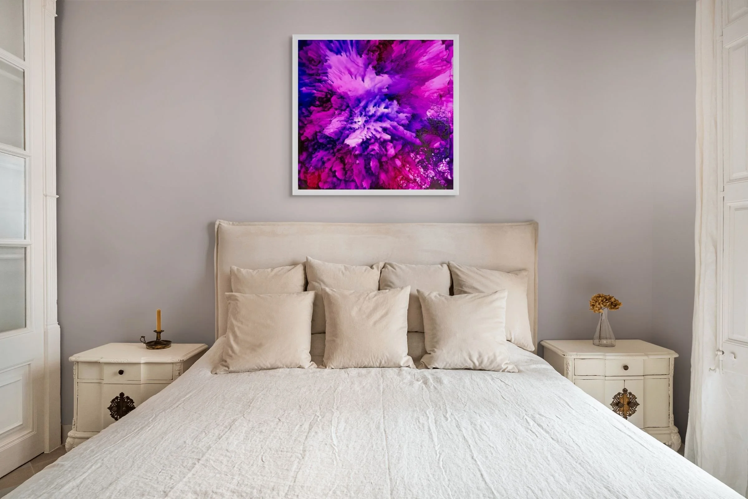 Vibrant purple abstract wall art with bold magenta textures displayed over bed for colorful home decor.