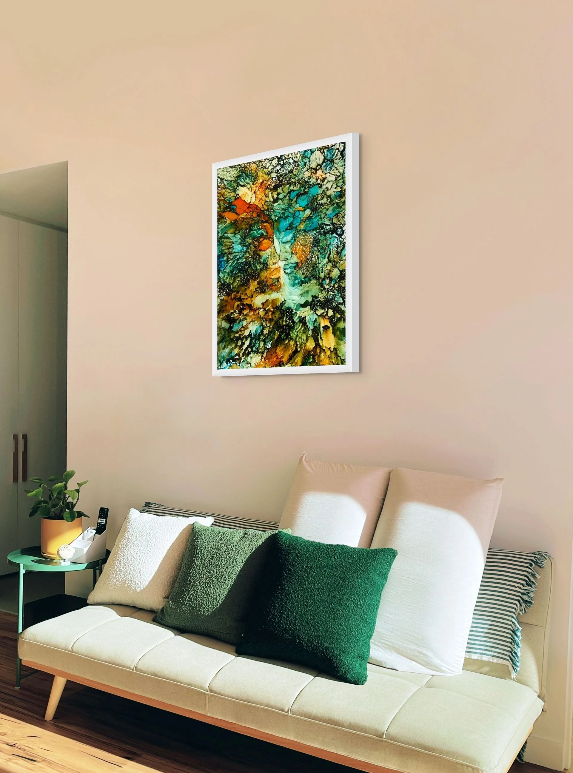 Green-and-gold abstract wall art displayed in a modern living room with organic textures and contemporary home decor.