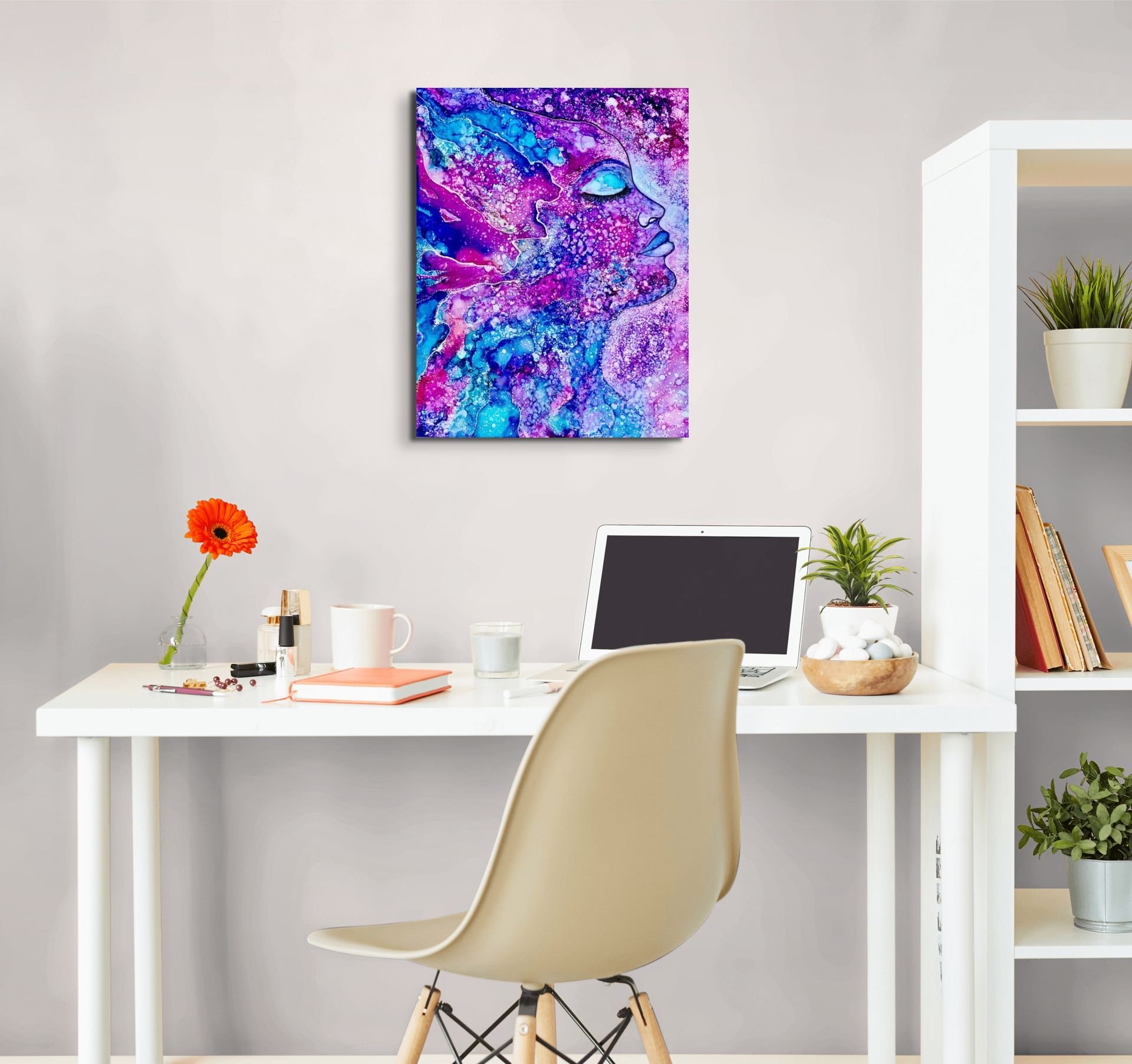 Colorful cosmic abstract wall art with pink, blue, and purple textures displayed in a modern contemporary home interior.