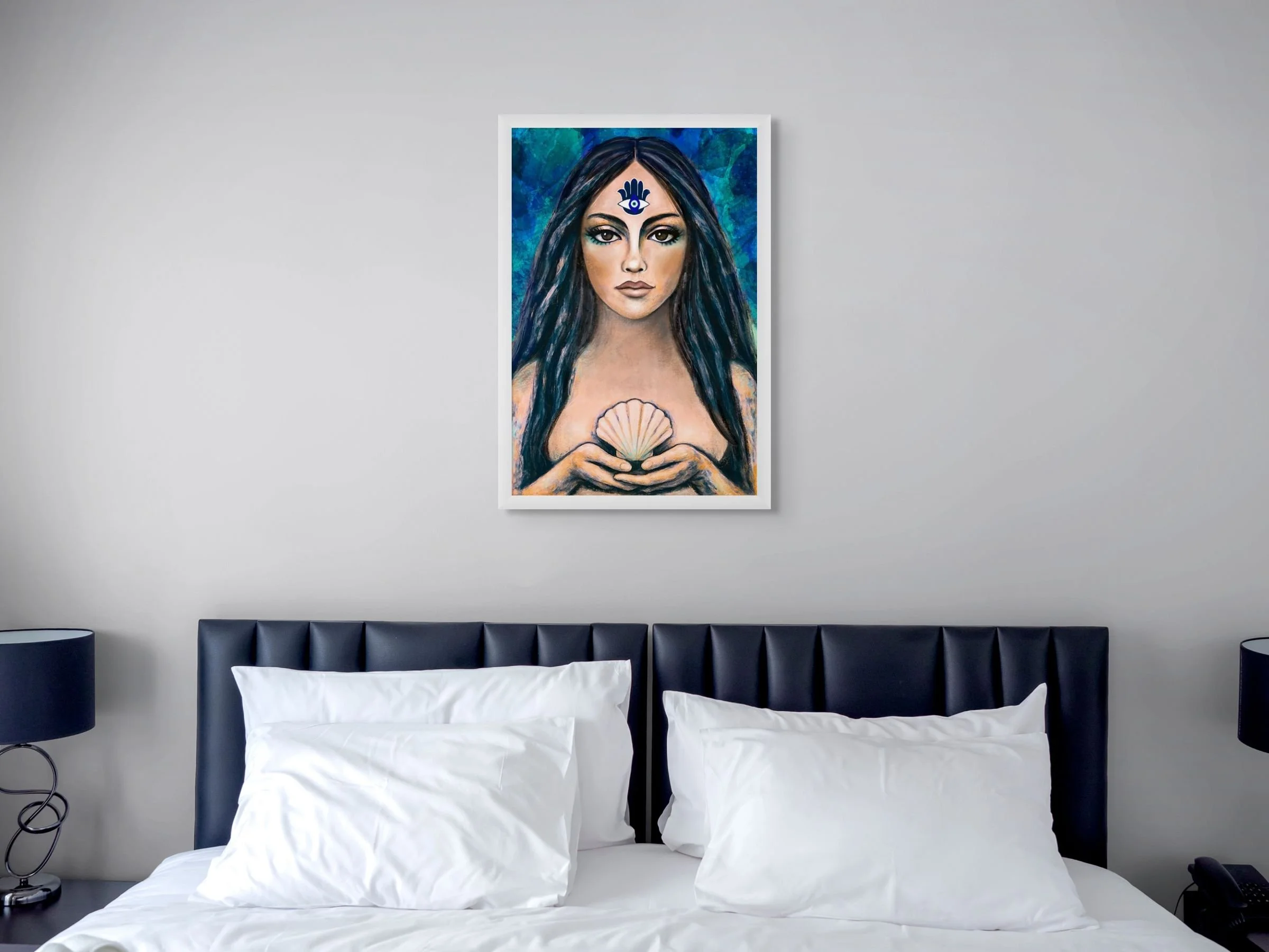 Coastal blue goddess portrait wall art with spiritual feminine energy displayed in a modern home interior with ocean-inspired decor.