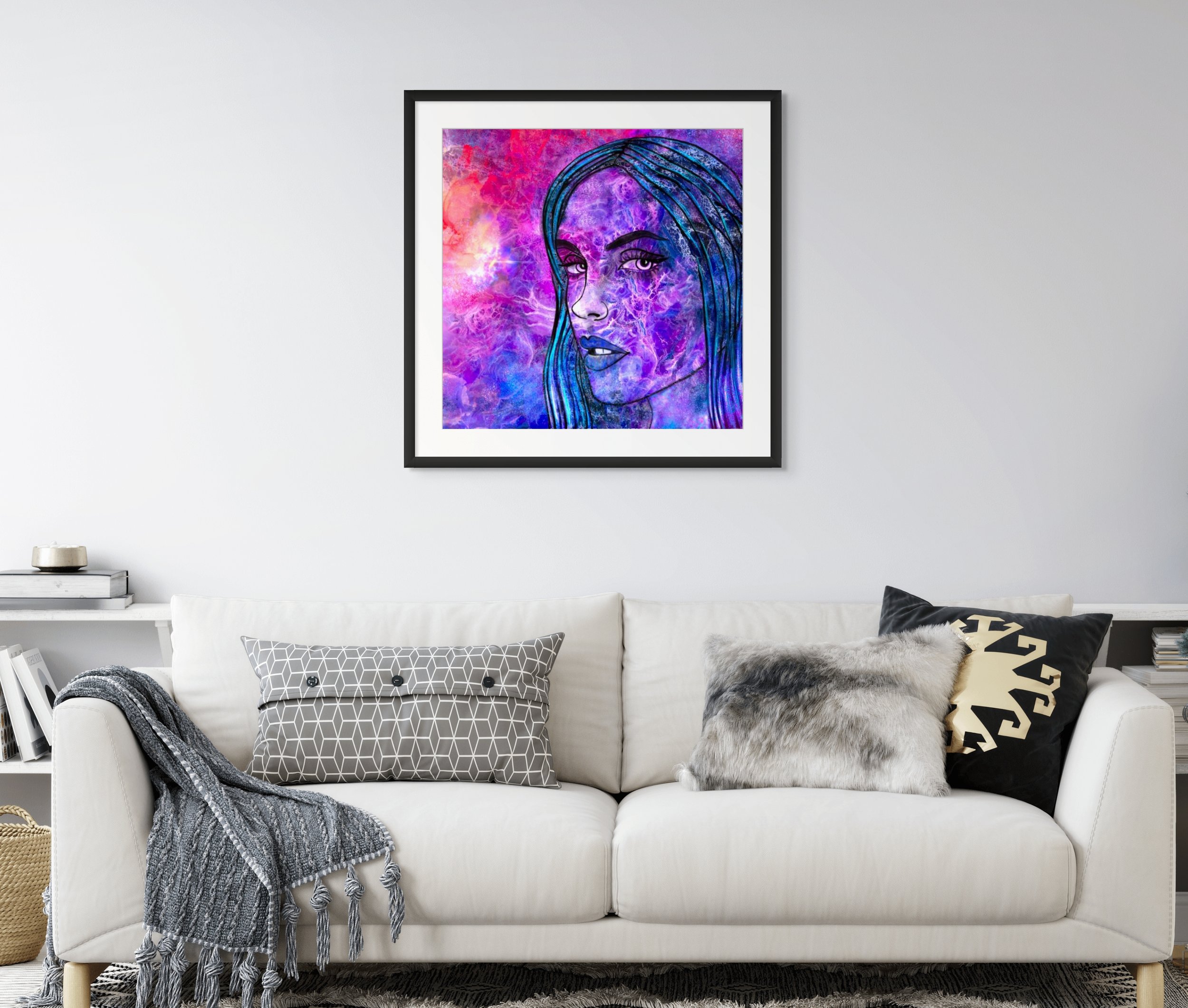 Purple and pink cosmic woman portrait wall art displayed in a modern living room with vibrant abstract textures and celestial decor.