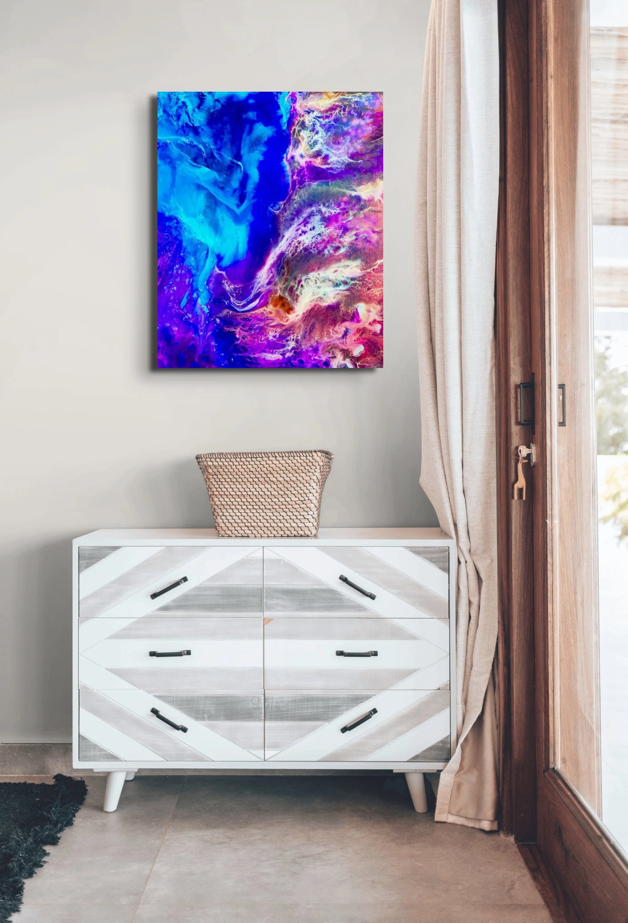 Vivid marbled abstract wall art with flowing cosmic textures displayed in a modern contemporary interior space.