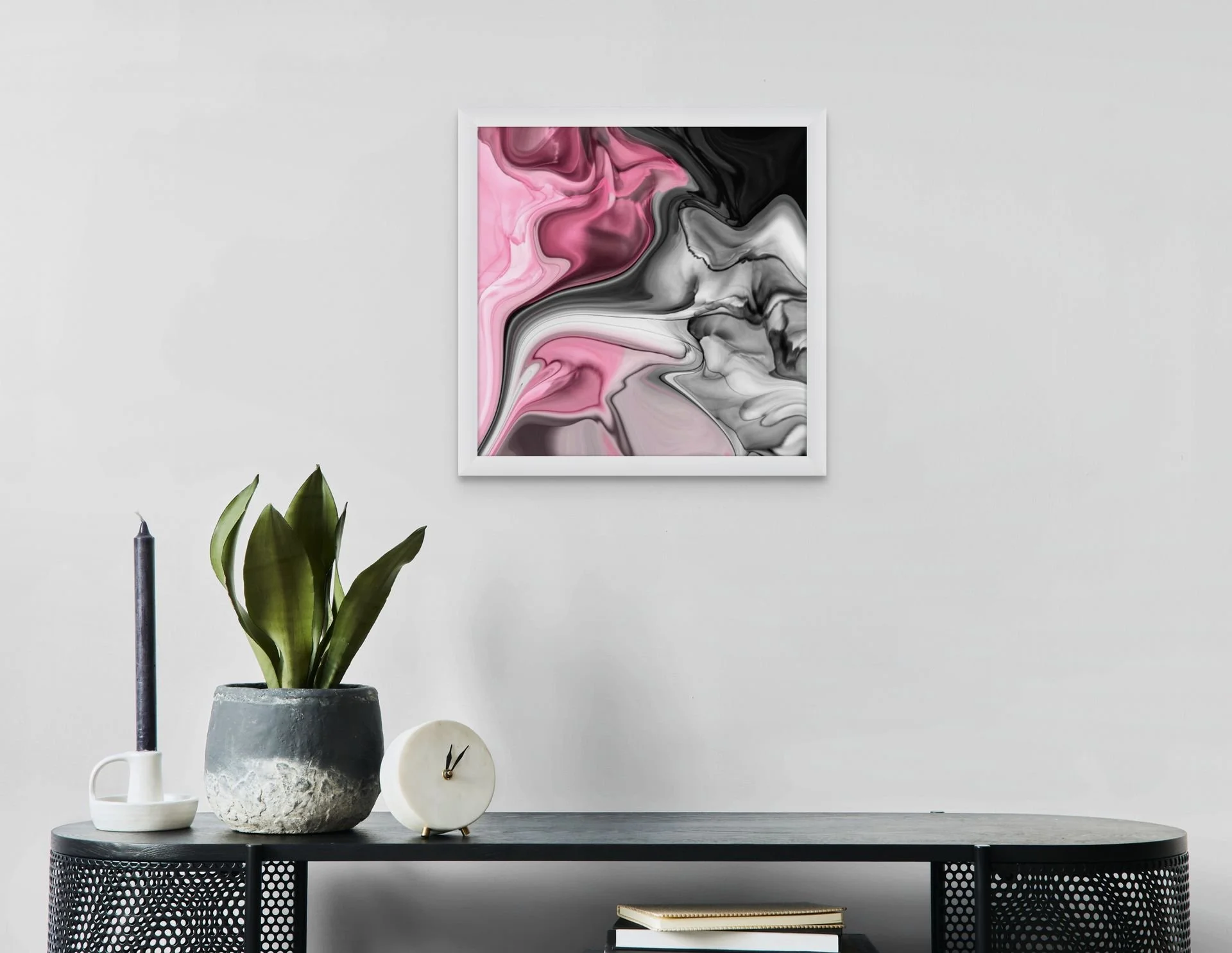 Pink, black, and white abstract wall art with flowing marble-inspired textures displayed in a modern interior space.