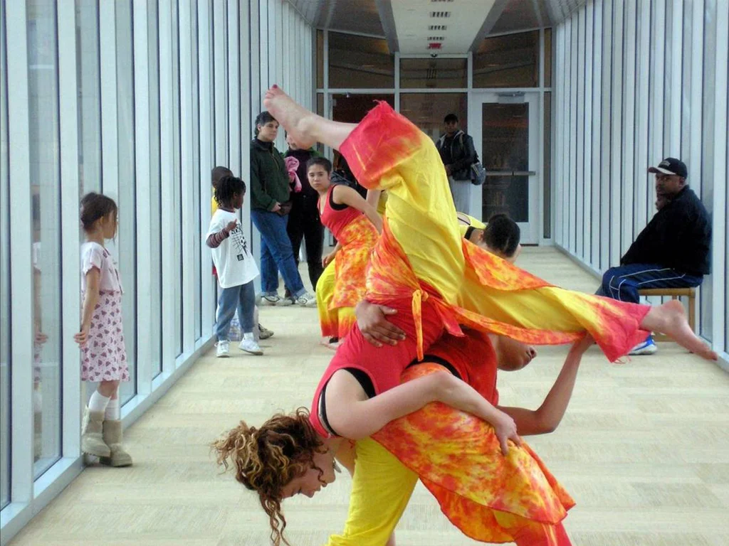 Dancers on CHUH Library Pedestrian Bridge