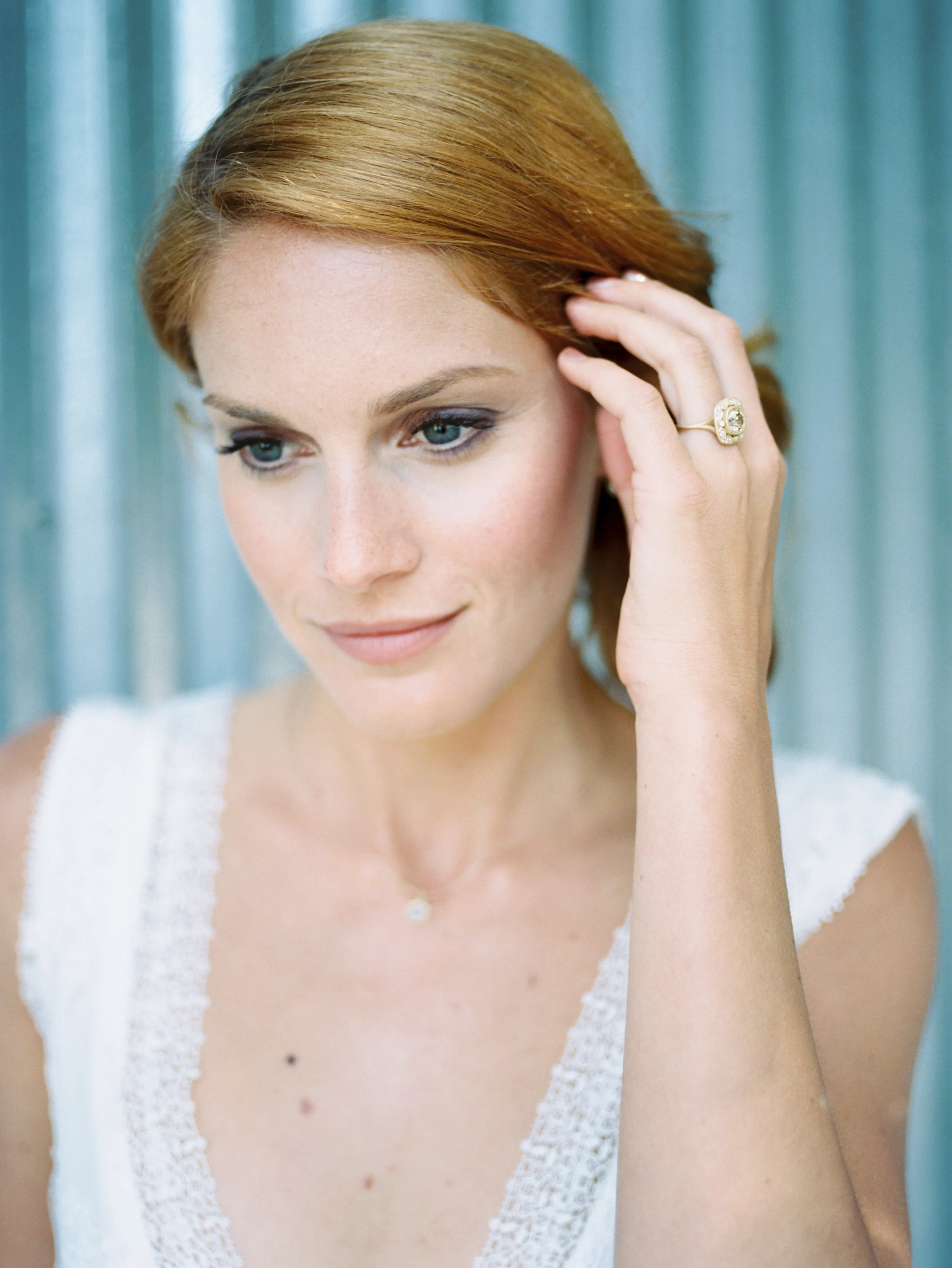 Photo by Ashley Kelemen Gown by Christina Sfez Jewels by Sofia Kaman Florals by Olive Willow Designs