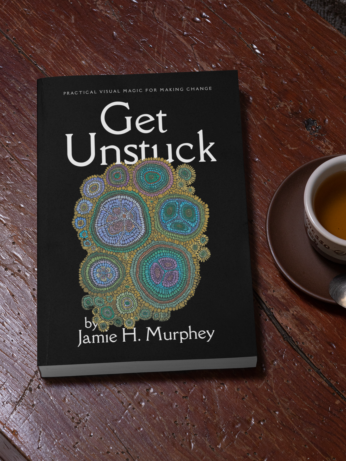 mockup-of-a-paperback-book-placed-on-a-wooden-table-33655.png