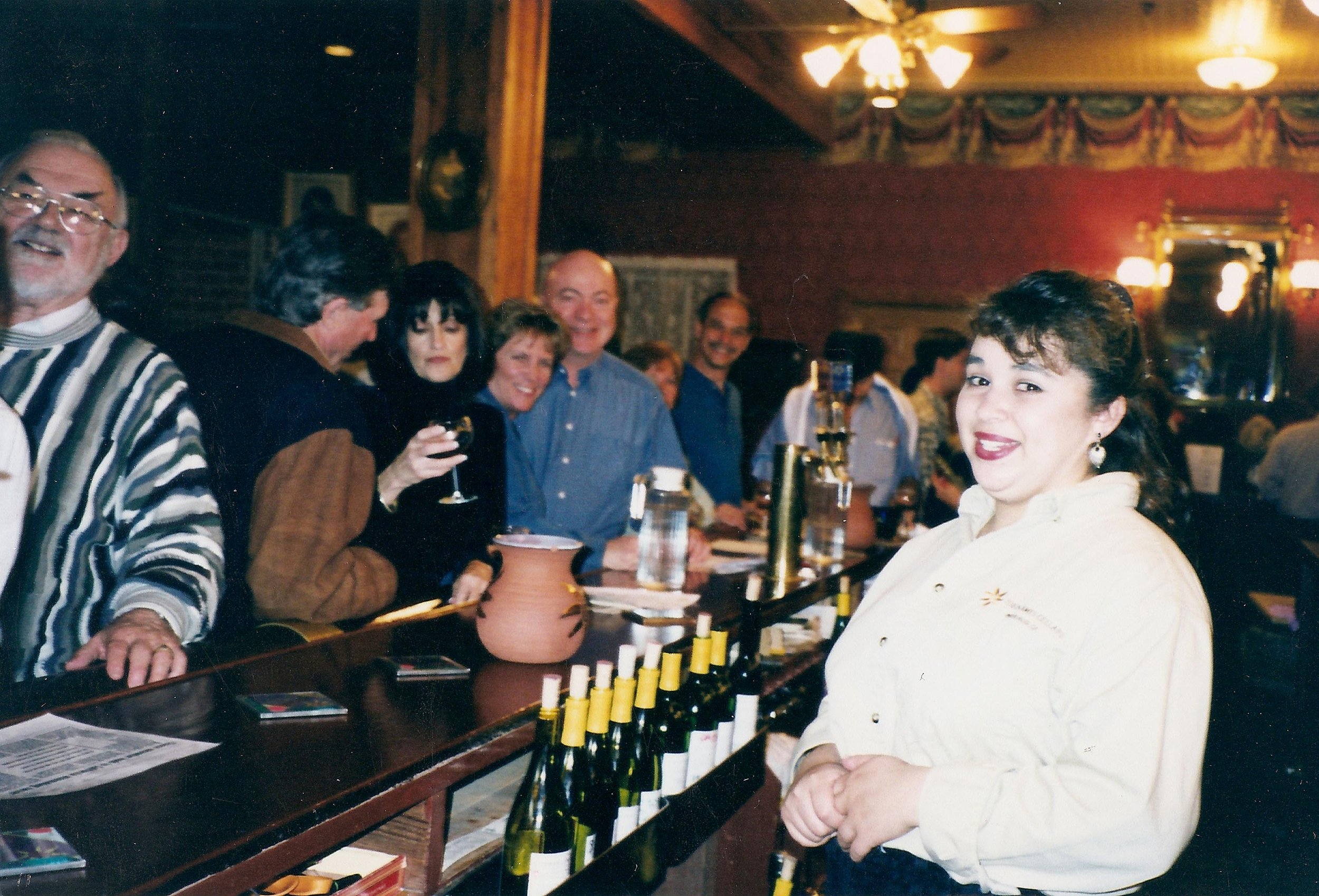 Ermie pouring at the bar