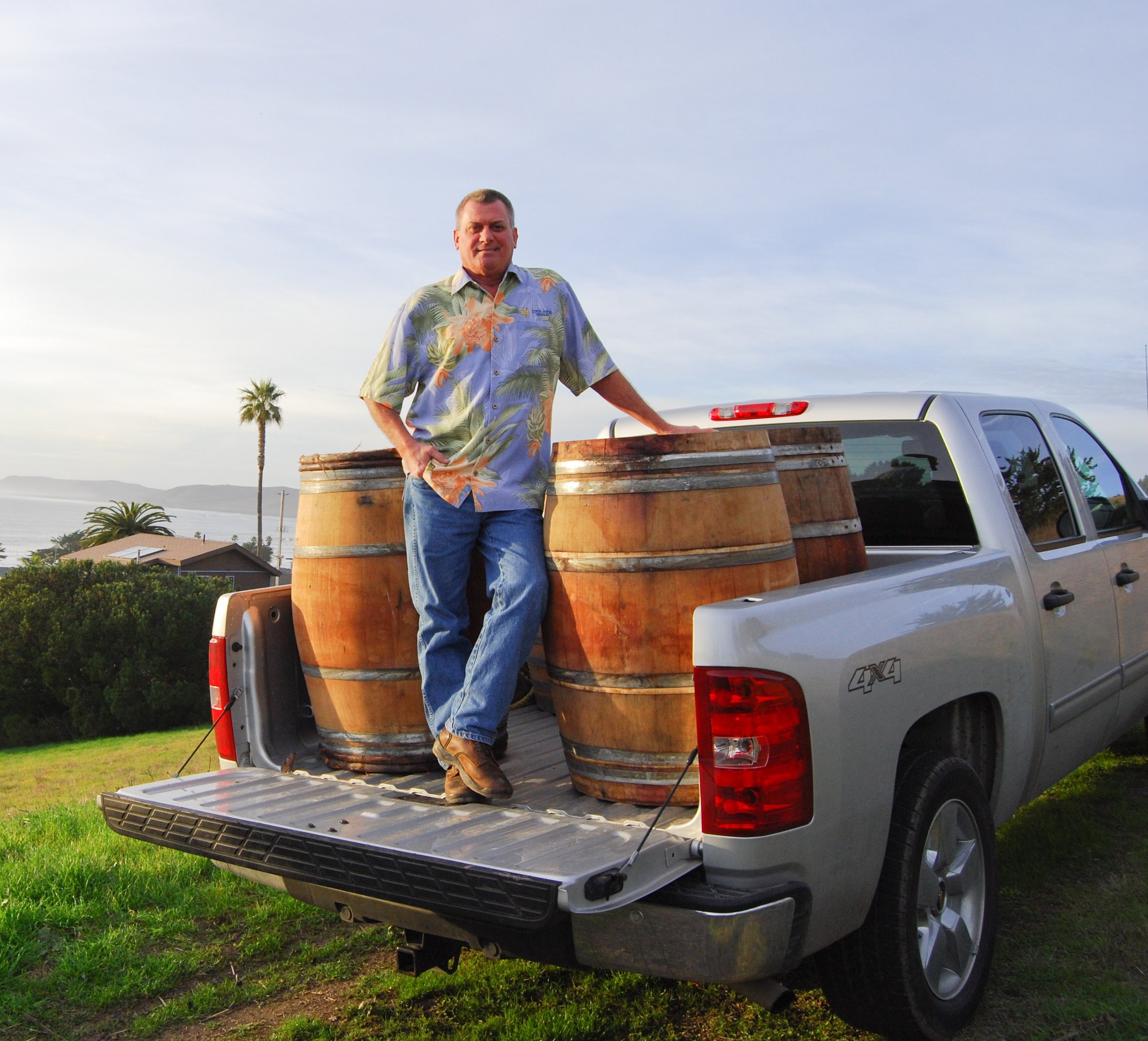 Tobin James with wine barrels in truck