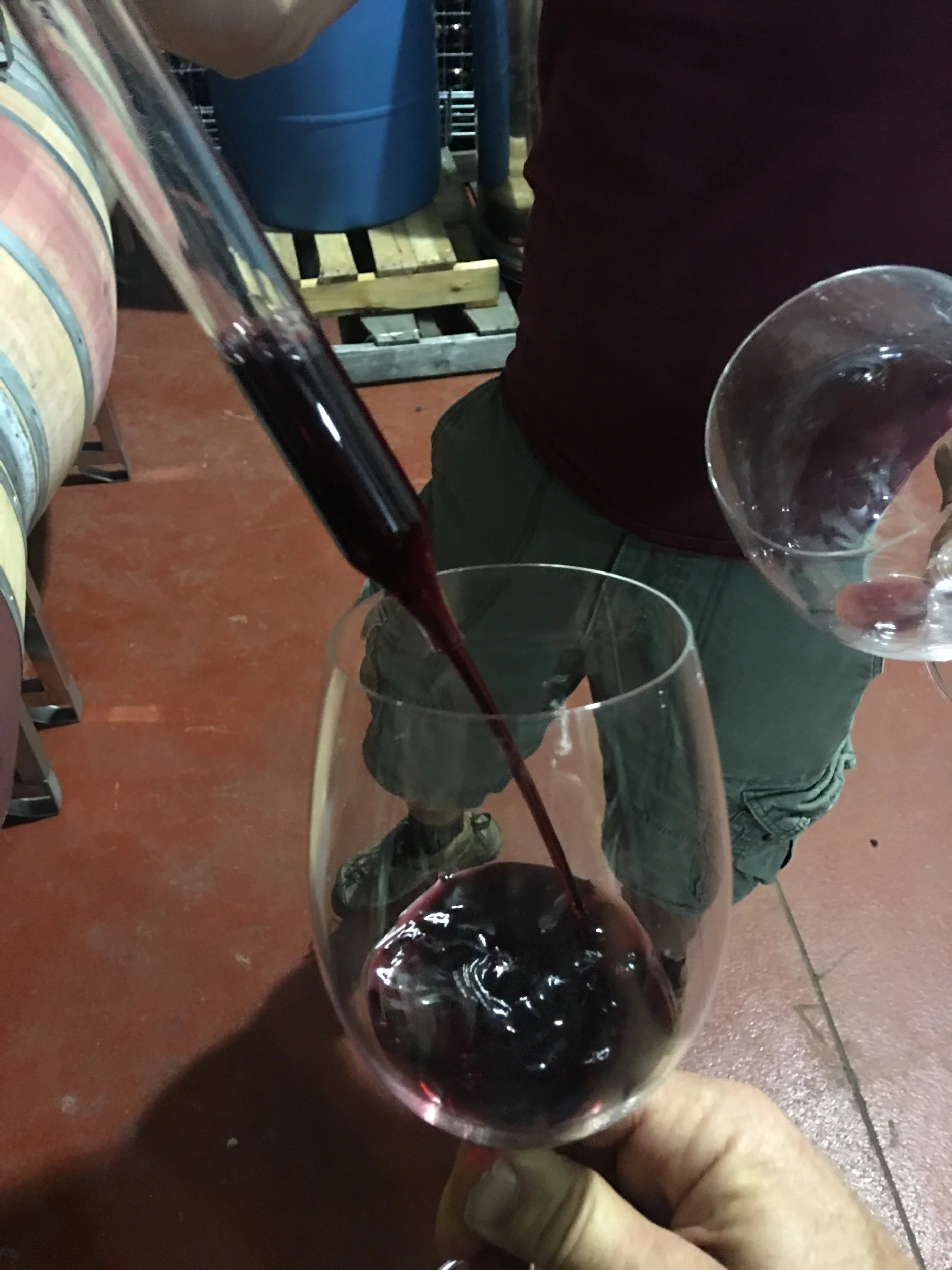 Pouring a sample from the “barrel thief”. The 2018 Mount Alto Vineyards red is a combo of 90% Cabernet Sauvignon and 10% Petit Verdot, co-fermented and aged as a single “field blend”.