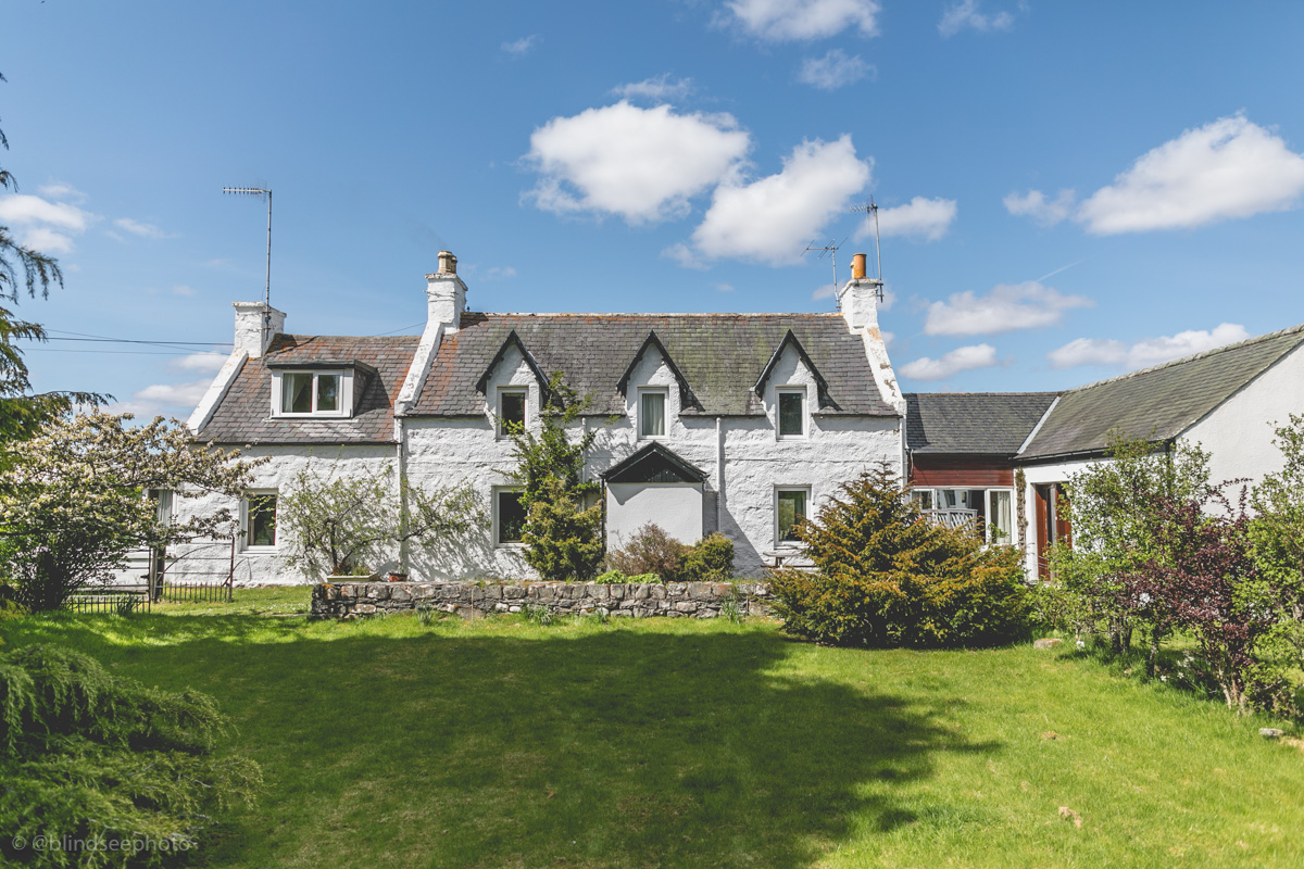 Soillerie House - front of house with garden area