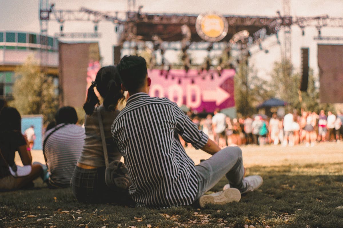 An outdoor concert is a great opportunity to leave your stresses behind and enjoy time with your significant other.