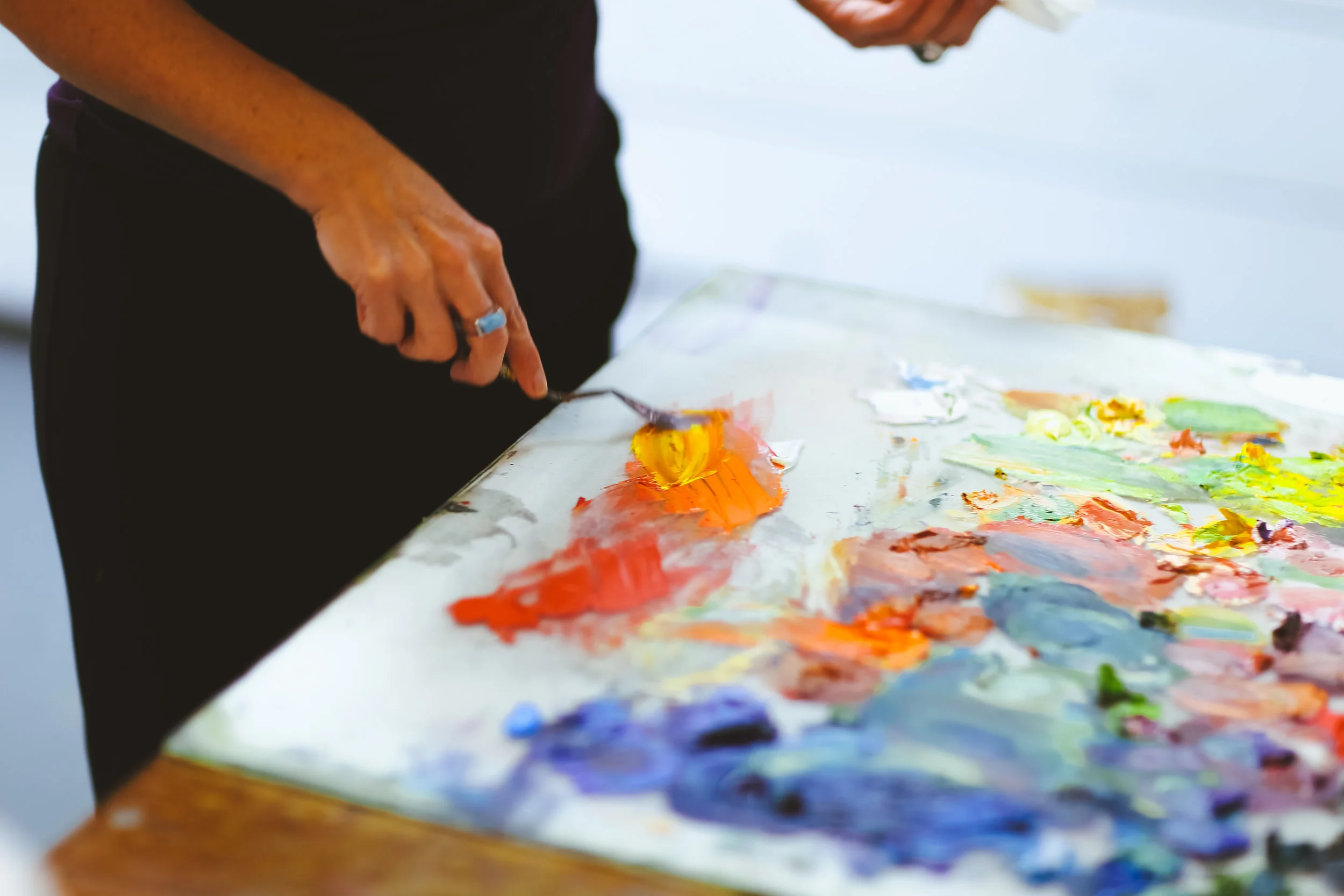 Mixing paint on my palette - I use a large piece of glass on a table, backed with white or grey paper.