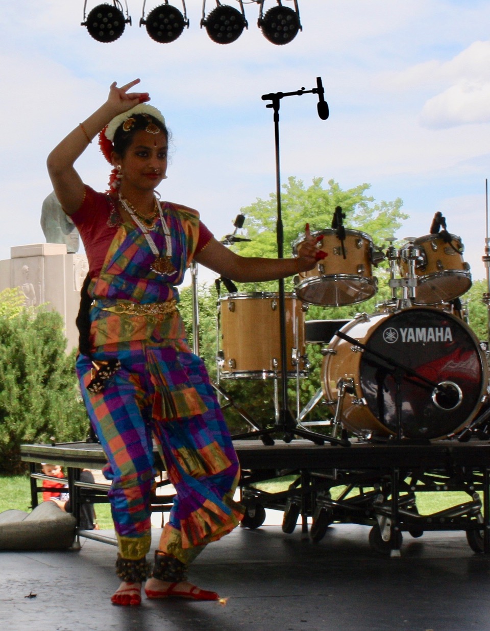 Alekya performs “ Pushpanjali” on stage at the World Village Fest.