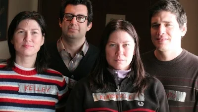 As per their name tags: Kelley Deal, Jose Medeles, Kim Deal, Mando Lopez
