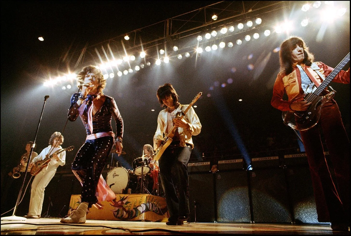 1972, Going glam, now with Mick Taylor on guitar, left, along with Mick, Charlie, Keith, and Bill