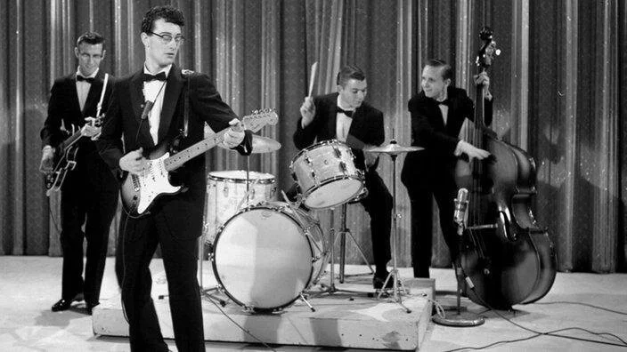 Buddy Holly & The Crickets, establishing the quartet as the foundation of the rock band