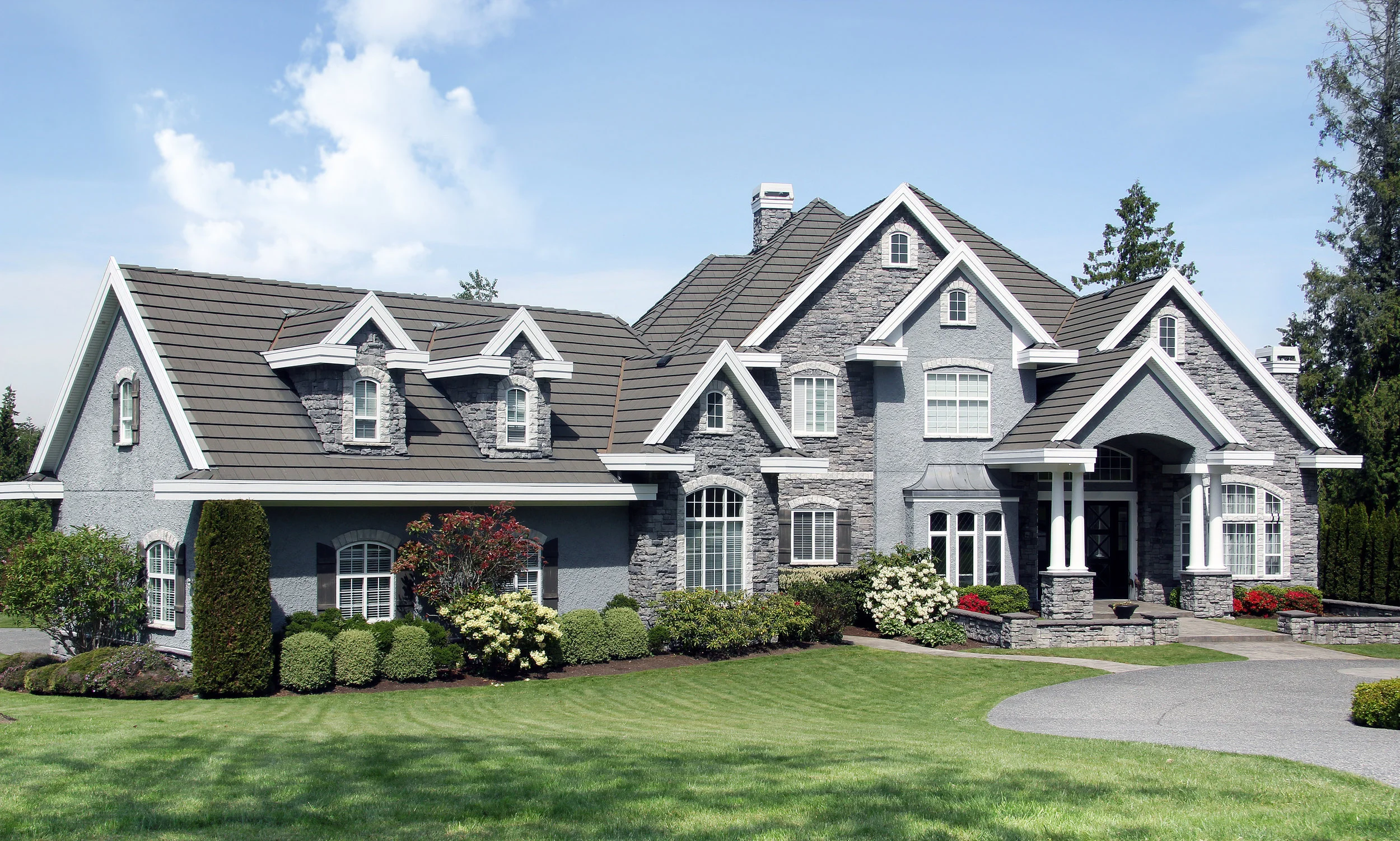 bigstock-Beautiful-luxury-mansion-with--127106204.jpg