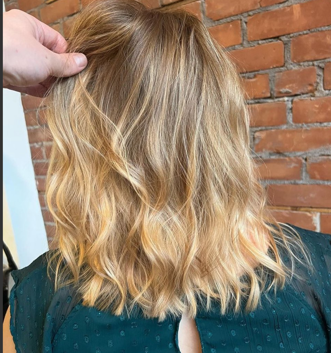 Peachy blonde wavy hair