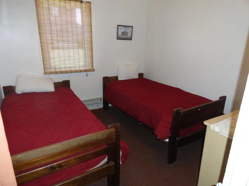 Tan cottage bedroom