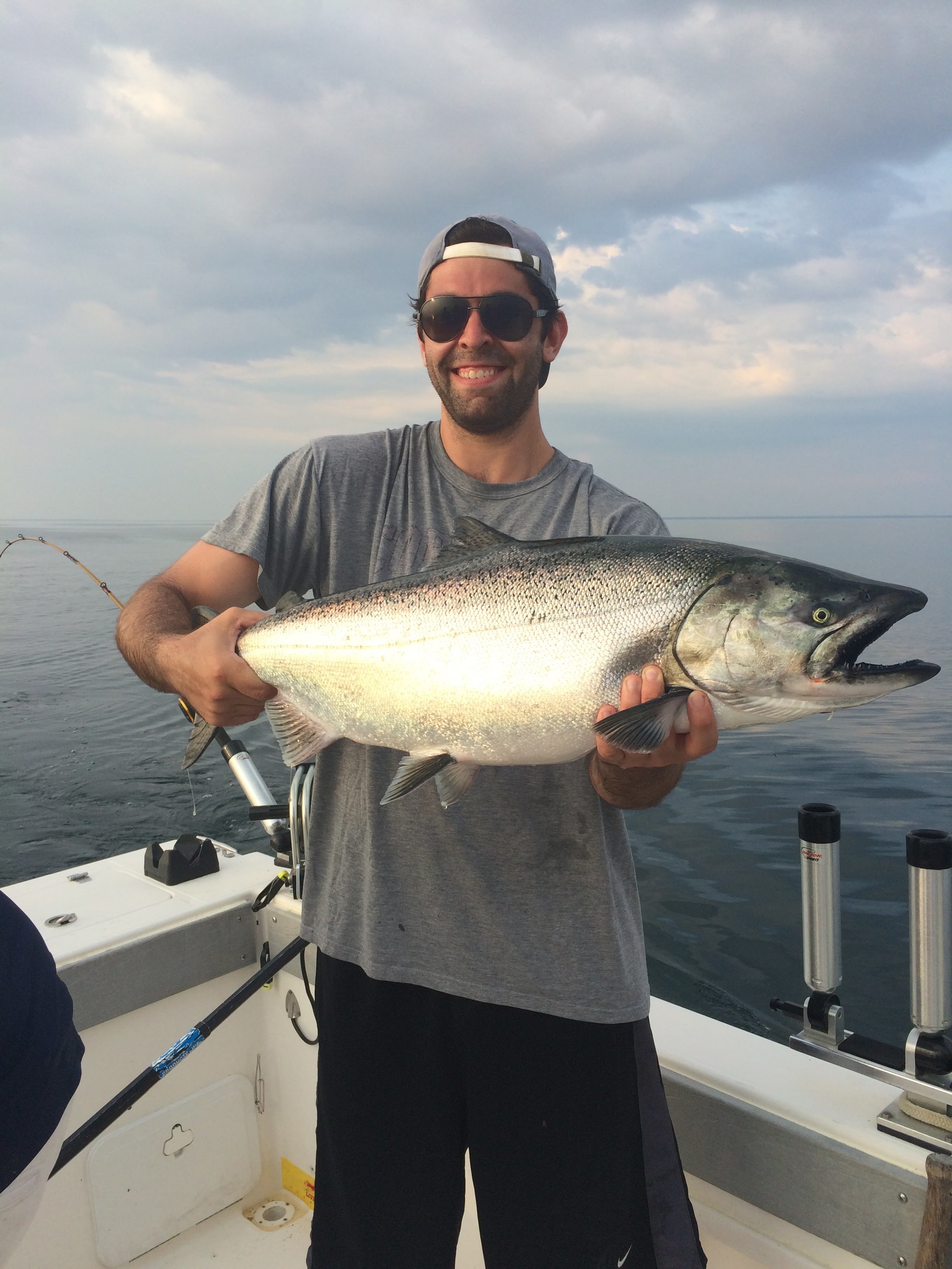 Man holding salmon fish