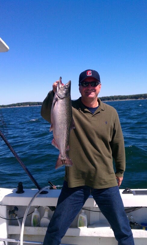 Man holding salmon fish