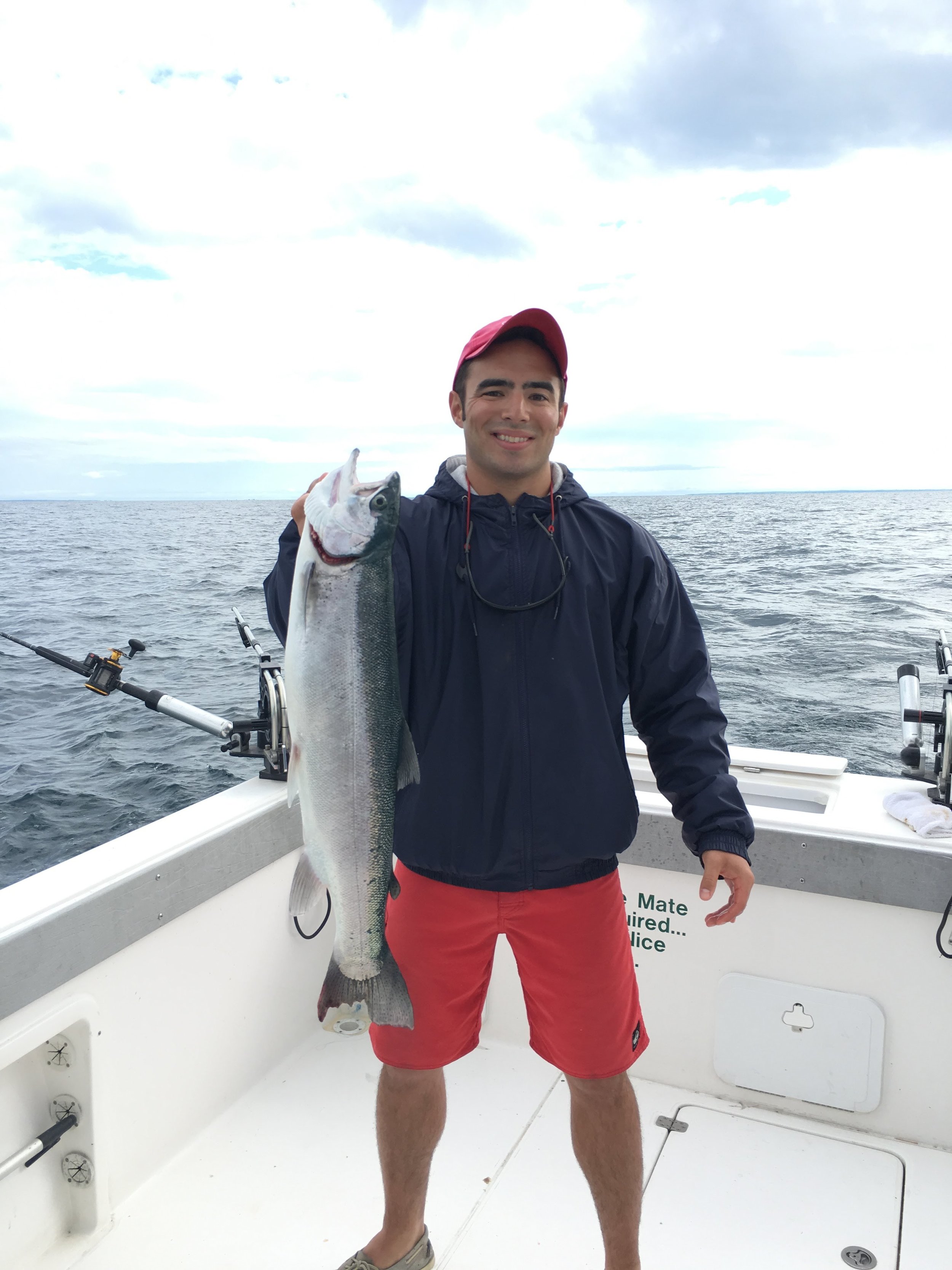 Man holding salmon fish