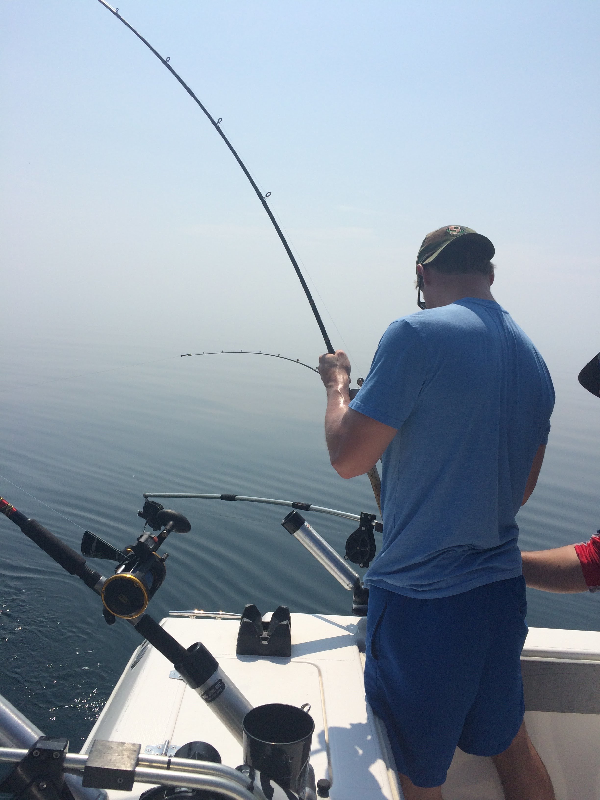 Man catching salmon fish