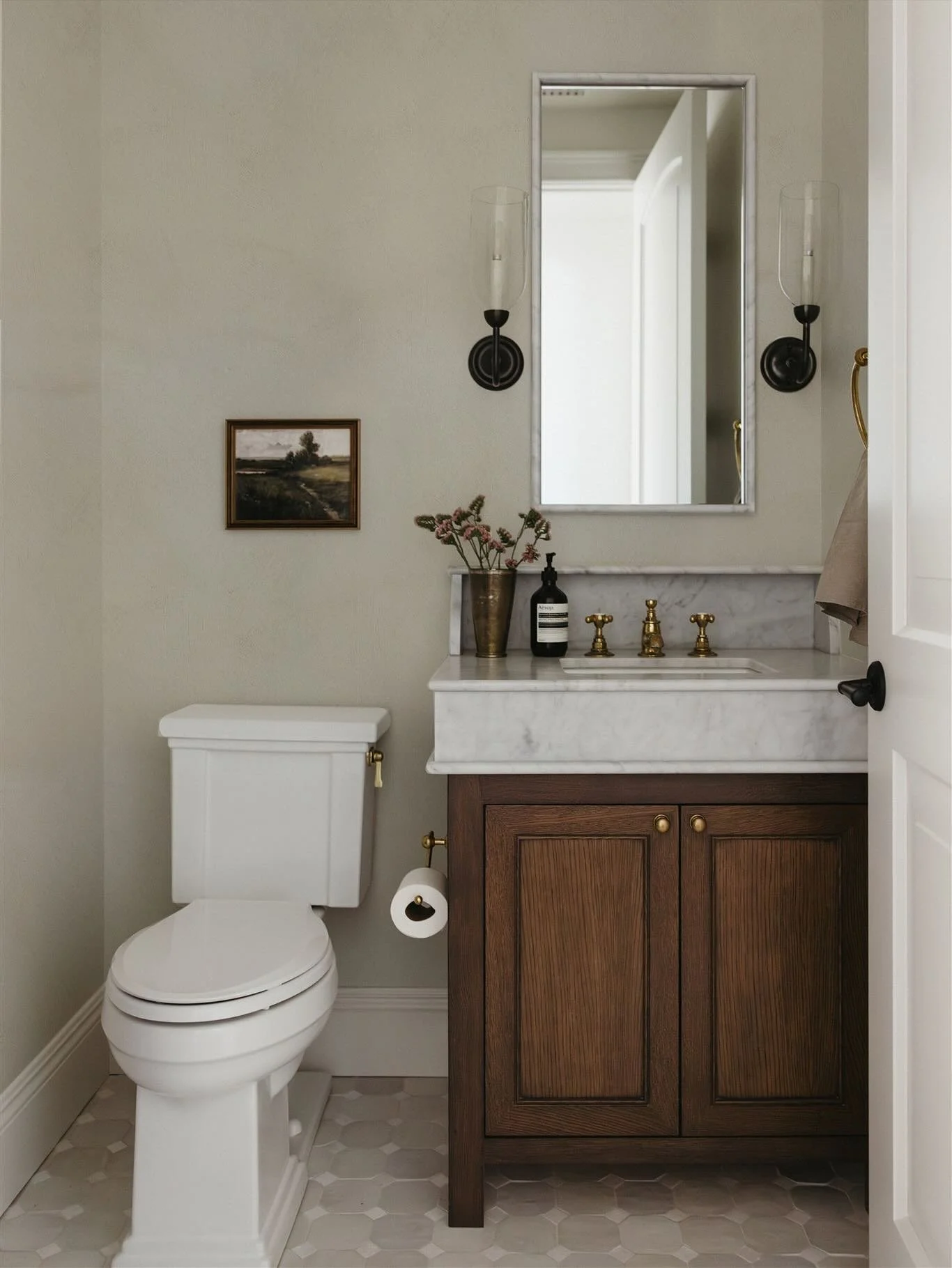 a powder room that packs a punch with all of my favorite finishes. designed by @jamesmayhomes featuring lime washed walls, handmade tiles, unlacquered brass and a marble mirror? yes, please! 🫧

 #interiorphotography #interiorphotographer #interiorin