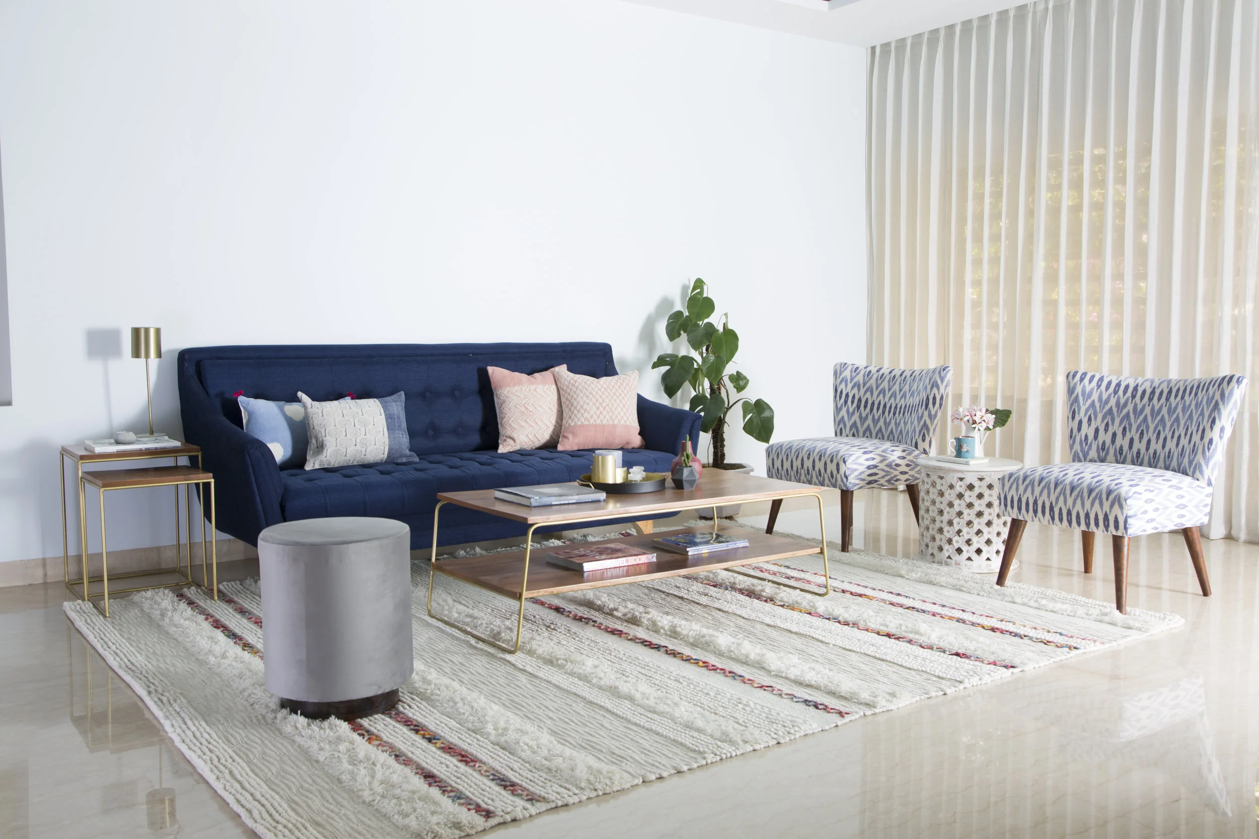   Love the clean look of this living room designed by the wonderful ladies- Nikita & Nitisha of NsquareStudio. One of my favorite home decor stores to visit & shop online. So hop on over to their    website    to shop their products, if you haven’t already!  