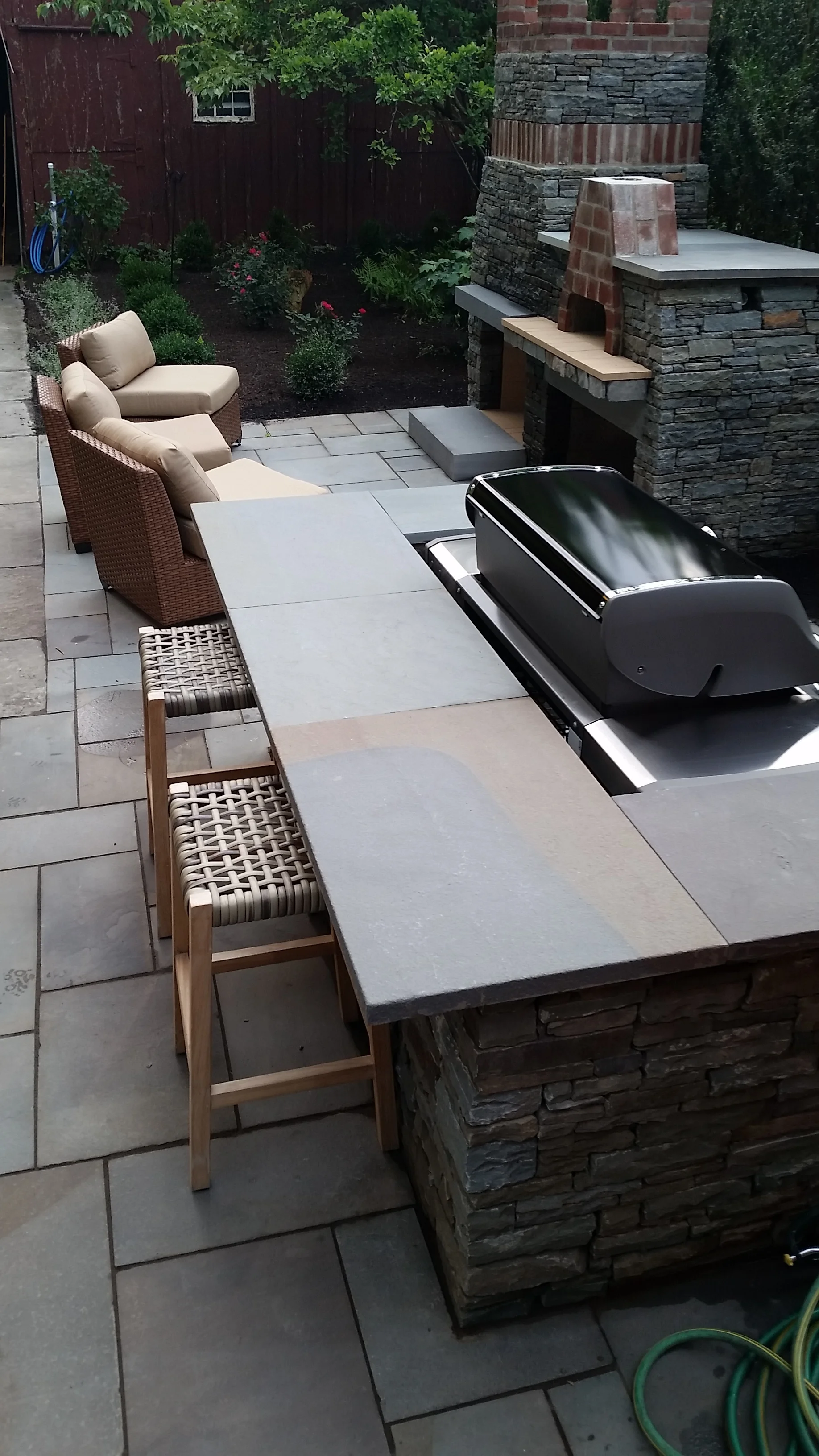 waitkus design outdoor kitchen and fireplace.jpg