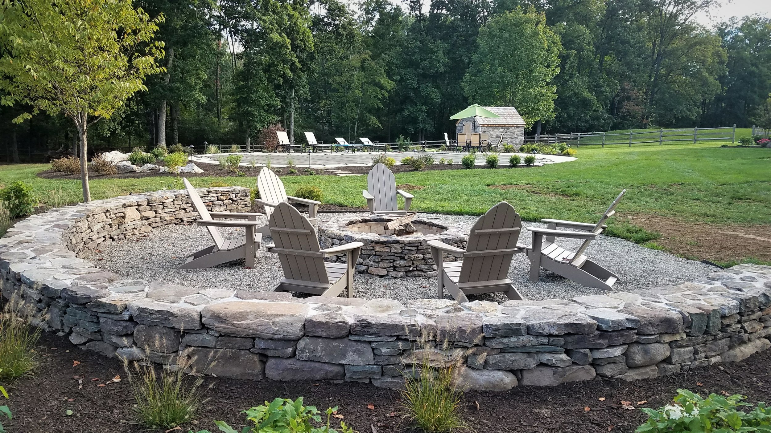 waitkus design stone firepit and wall.jpg