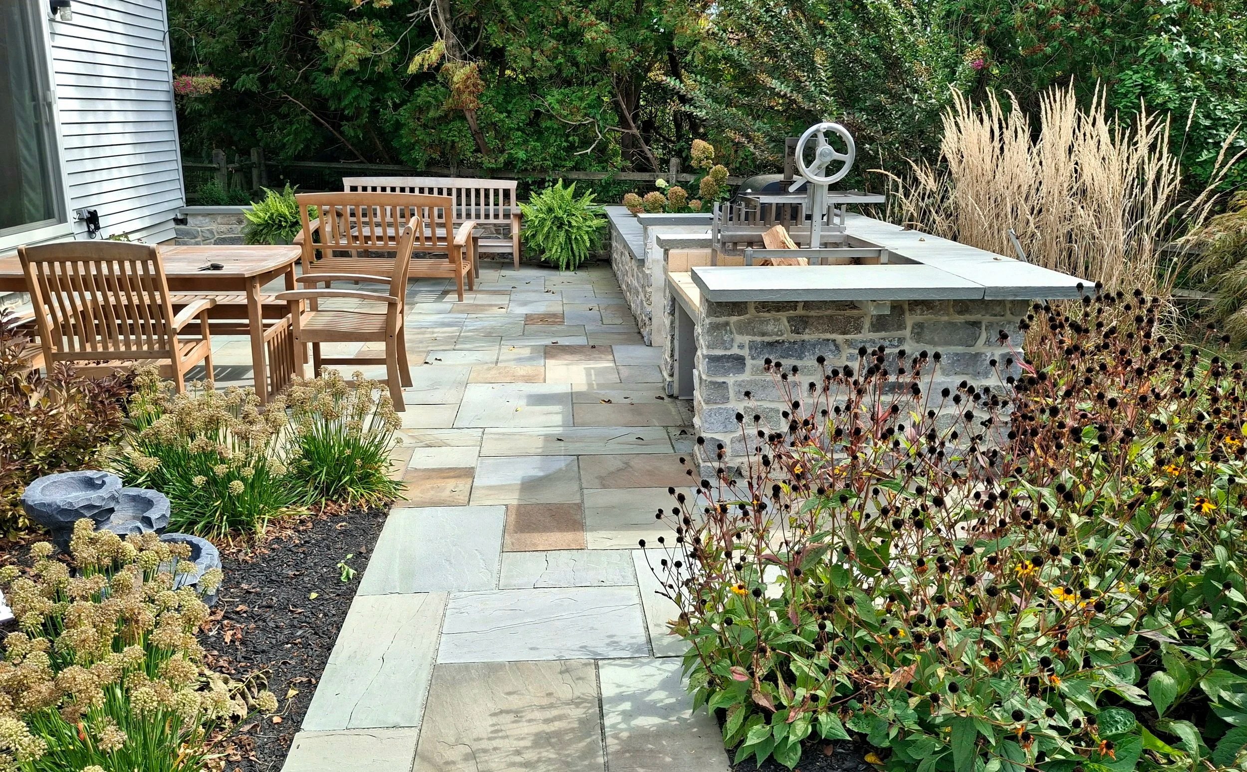 Bluestone patio and stone grilling station.
