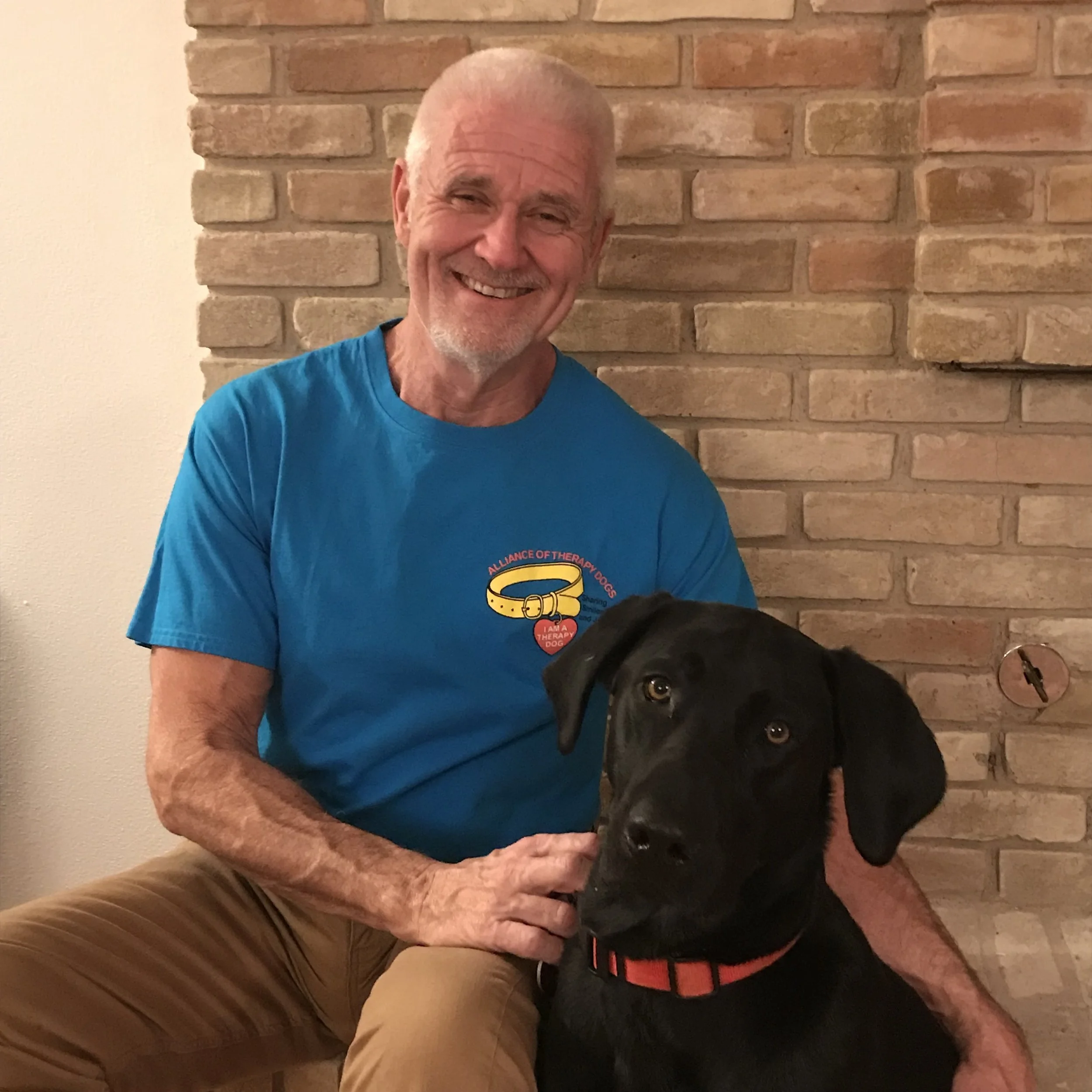 Tom Crowley & Therapy Dog Rocky after their Spanish final exam