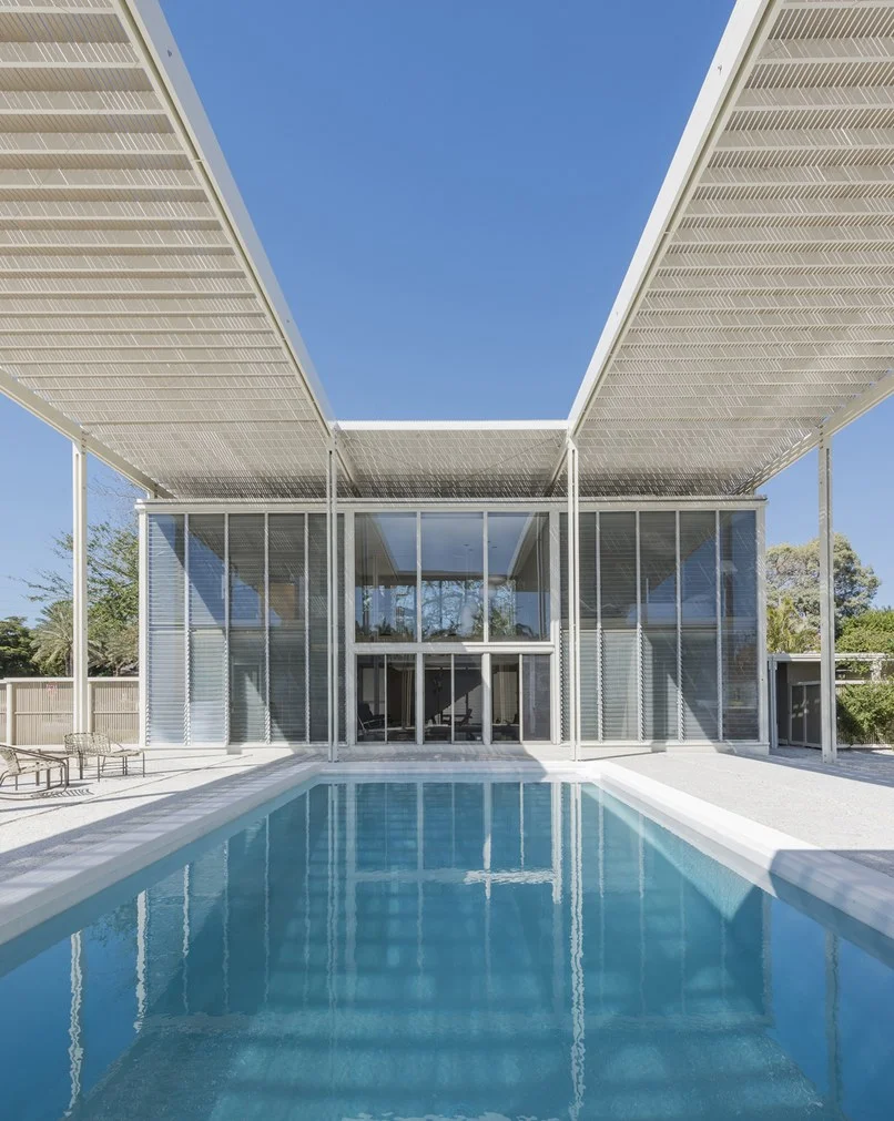 Pool with slatted wood “umbrella” canopy, Rudolph’s Umbrella House. Photo: Anton Grassl