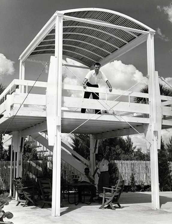Paul Rudolph in Florida, on the upper deck of the lookout tower of a building he designed: the Sanderling Beach Club, Siesta Key (photo taken circa 1953). Photo: Library of Congress, Prints and Photographs Division, Paul Rudolph Archive
