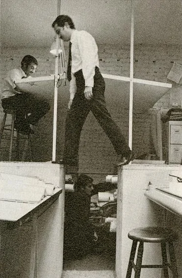 Of all the photos we’ve seen of the insides of Paul Rudolph’s various offices, this is one that intrigues us most. In this version of the drafting room, the lower level was used for “tube storage” of rolled-up architectural drawings, and drafting stations were positioned on platforms above. Errol Barron says that’s a photo of a staff member of Rudolph’s office, Max Lieberman, stepping across the gap—and describes that getting around the office as having its adventurous side.. Image © The Estate of Paul Rudolph, The Paul Rudolph Heritage Foundation.