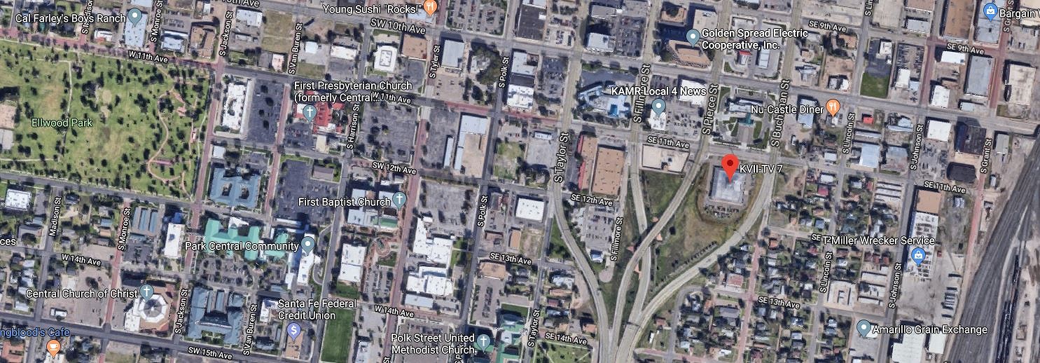 The context for the building: A satellite view of the neighborhood where the pyramidal TV station is located in Amarillo, Texas. North is towards the top, and the building’s roof is marked by the red arrow. Amarillo’s Elwood Park is at the far left, and railroad lines are at the right edge of the photo. The several forking roads, which merge towards at the bottom of the picture, converge to form US Highway 287. Image courtesy of Google: Imagery ©2019 Google, Imagery ©2019 Maxar Technologies.