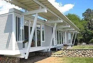 The Cerritto Residence was designed by Paul Rudolph in 1955, for a site in Westerly, Rhode Island. The exterior featured prominent sun shading elements, parallel to (and set slightly higher than) the roof plane. They are supported on articulated woo…