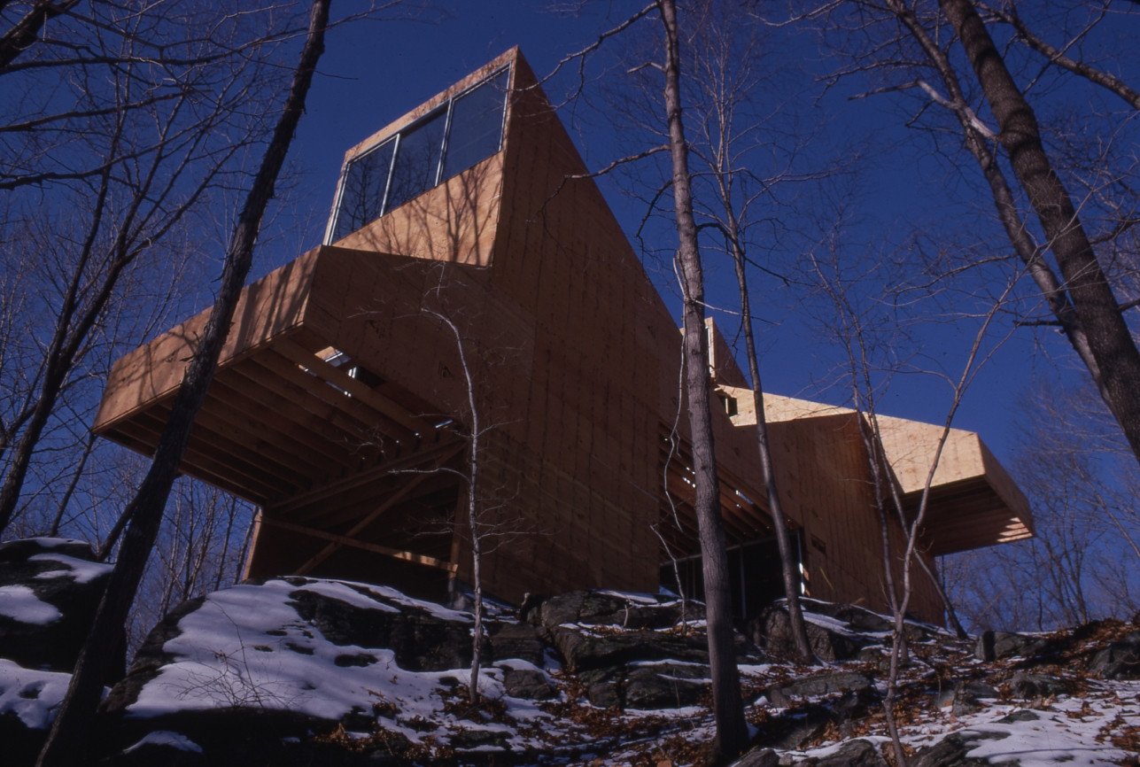 Construction photos of the Goldfinger Residence designed in 1969 by Myron Goldfinger in Waccabuc, New York.  The design, a series of simple rotated and mirrored shed forms, reflects the influence of Paul Rudolph, one of his professors in college.⁠
⁠
