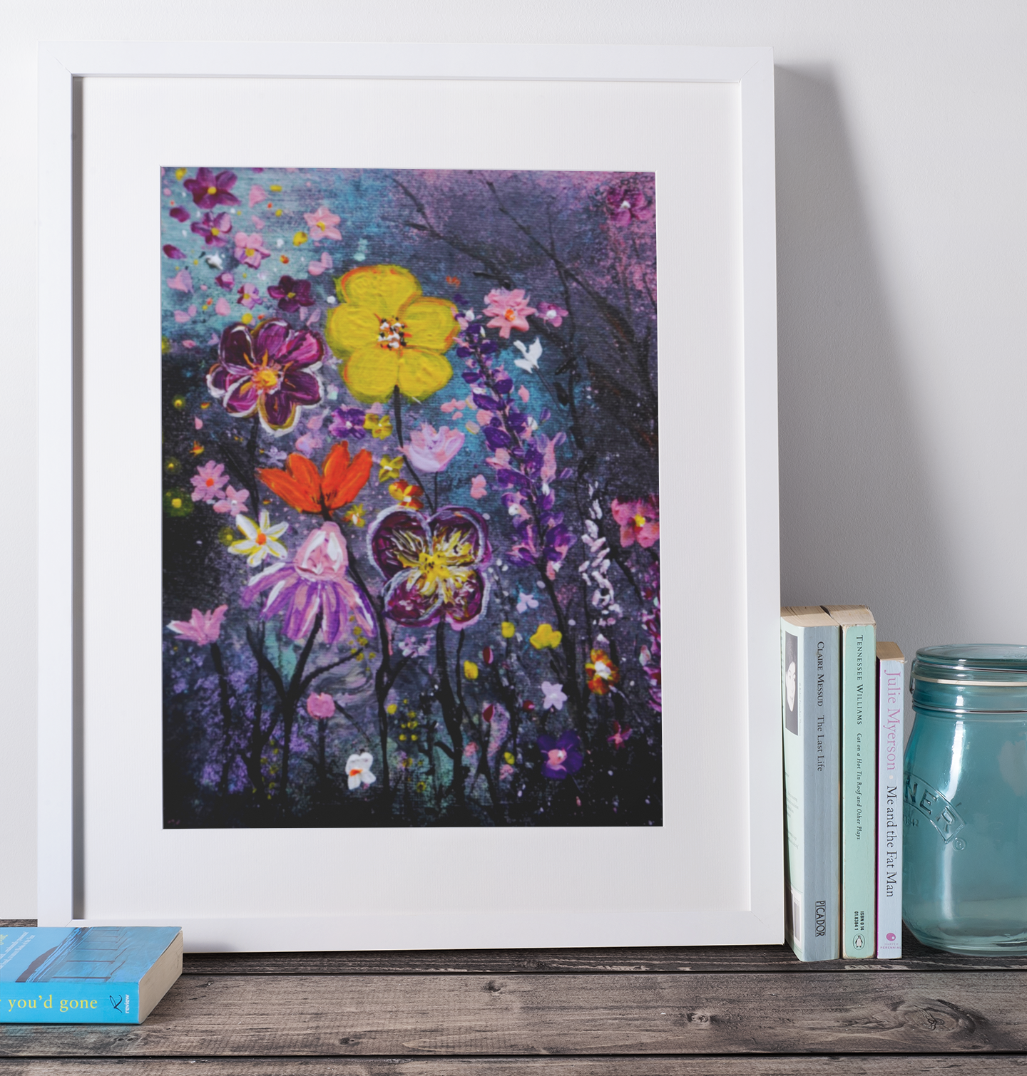 mockup-of-a-picture-frame-placed-over-a-wooden-surface-by-some-books-598-el.png