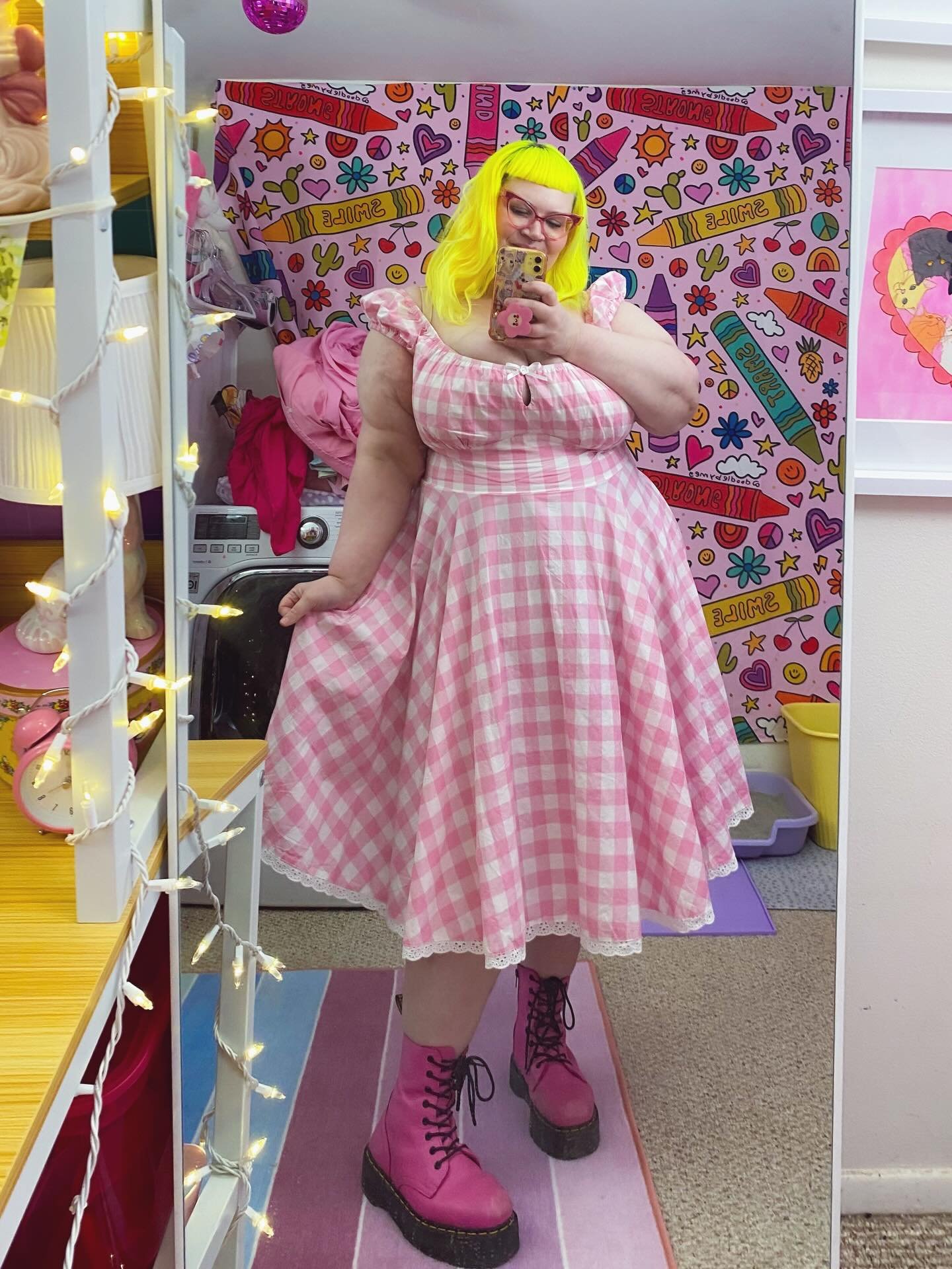 i'm living for (&amp; in!) pink gingham dresses &amp; pink doc martens this spring 🌸 cindy midi dress in a 4x by @hellbunnyofficial 💕👗✨ i *especially* love the structured corset-inspired bodice &amp; the details, like the lil white bow with a matc